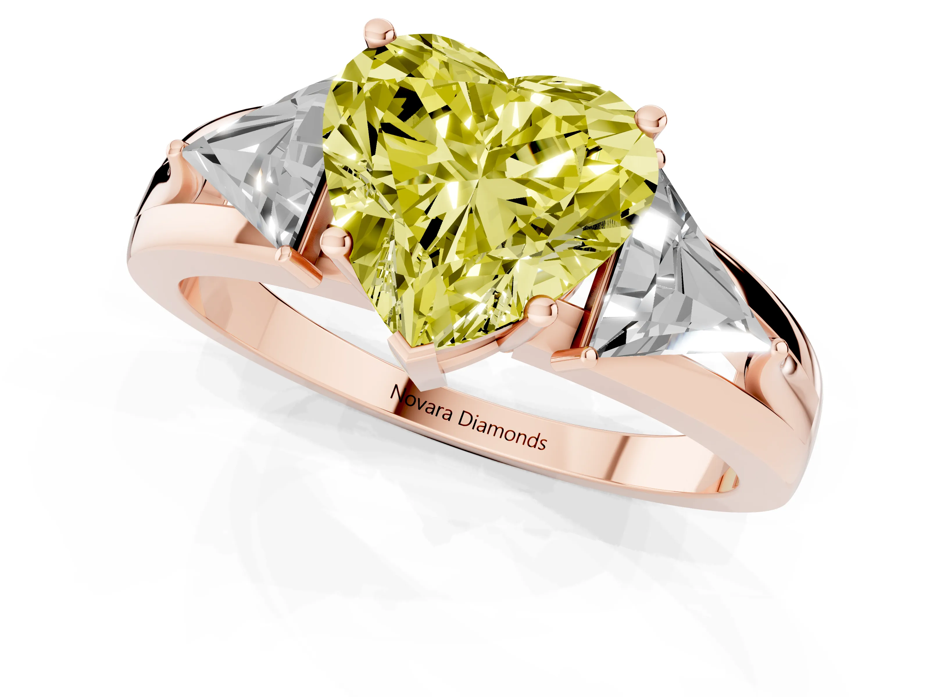 Fancy Yellow Heart Cut Diamond Three-Stone Ring Set in Rose gold with Trillion Side Stones and Split Shank