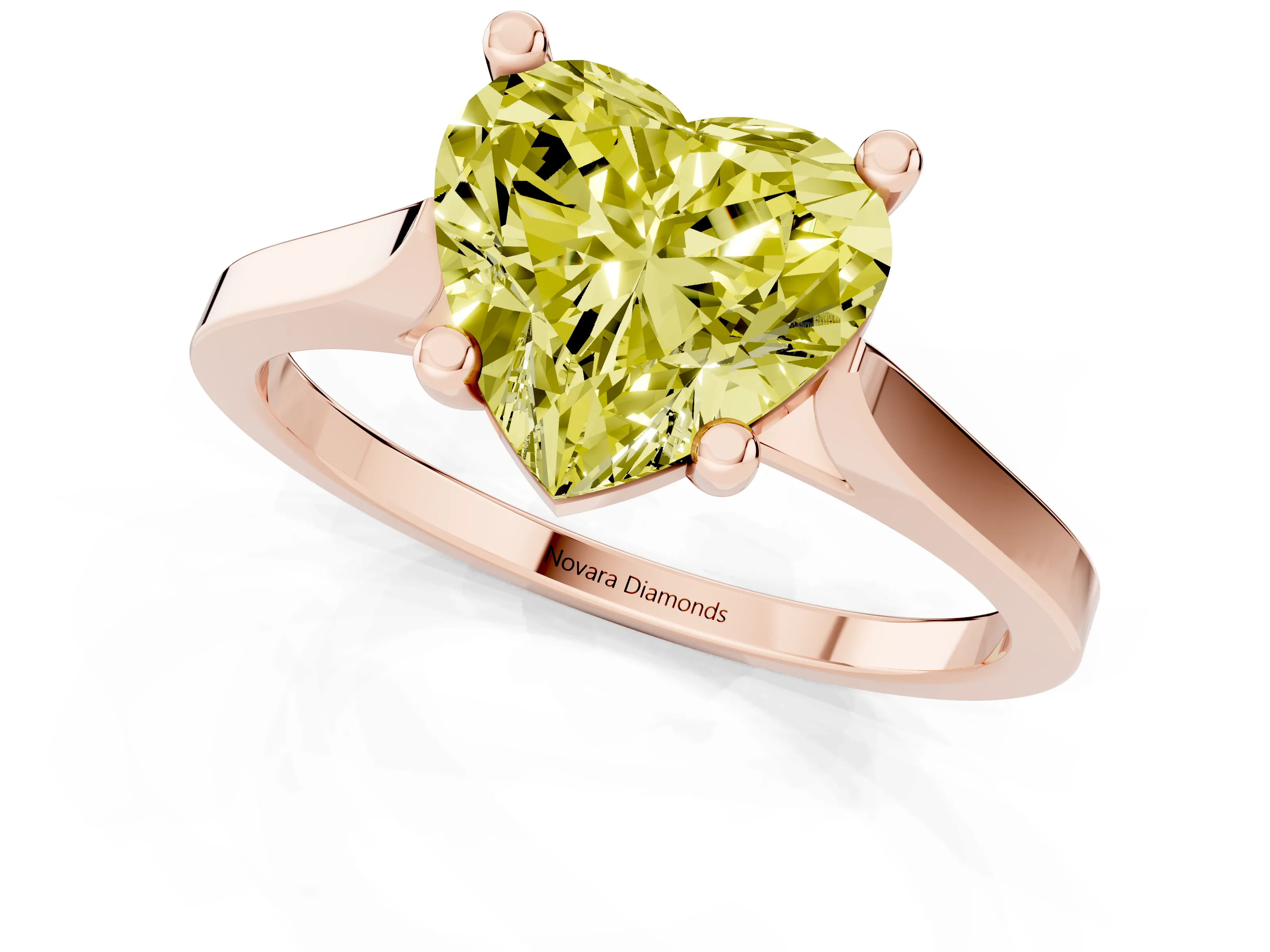 Fancy Yellow Heart Cut Diamond Solitaire Ring Set in Rose gold with Prong Setting and Tapered Band