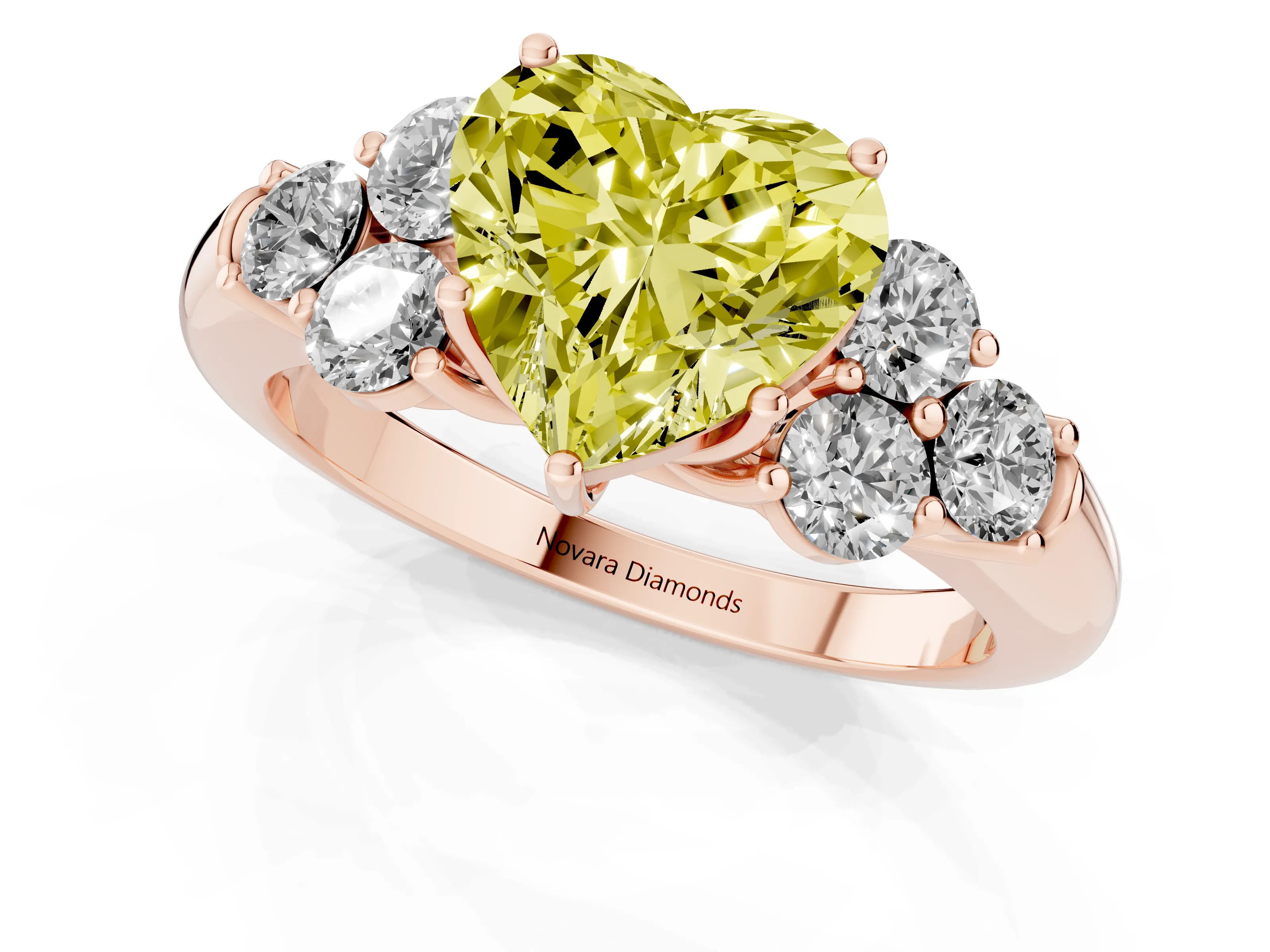Fancy Yellow Heart Cut Diamond Cluster Ring Set in Rose gold with Round Accent Stones and Prong Setting on a Plain Band