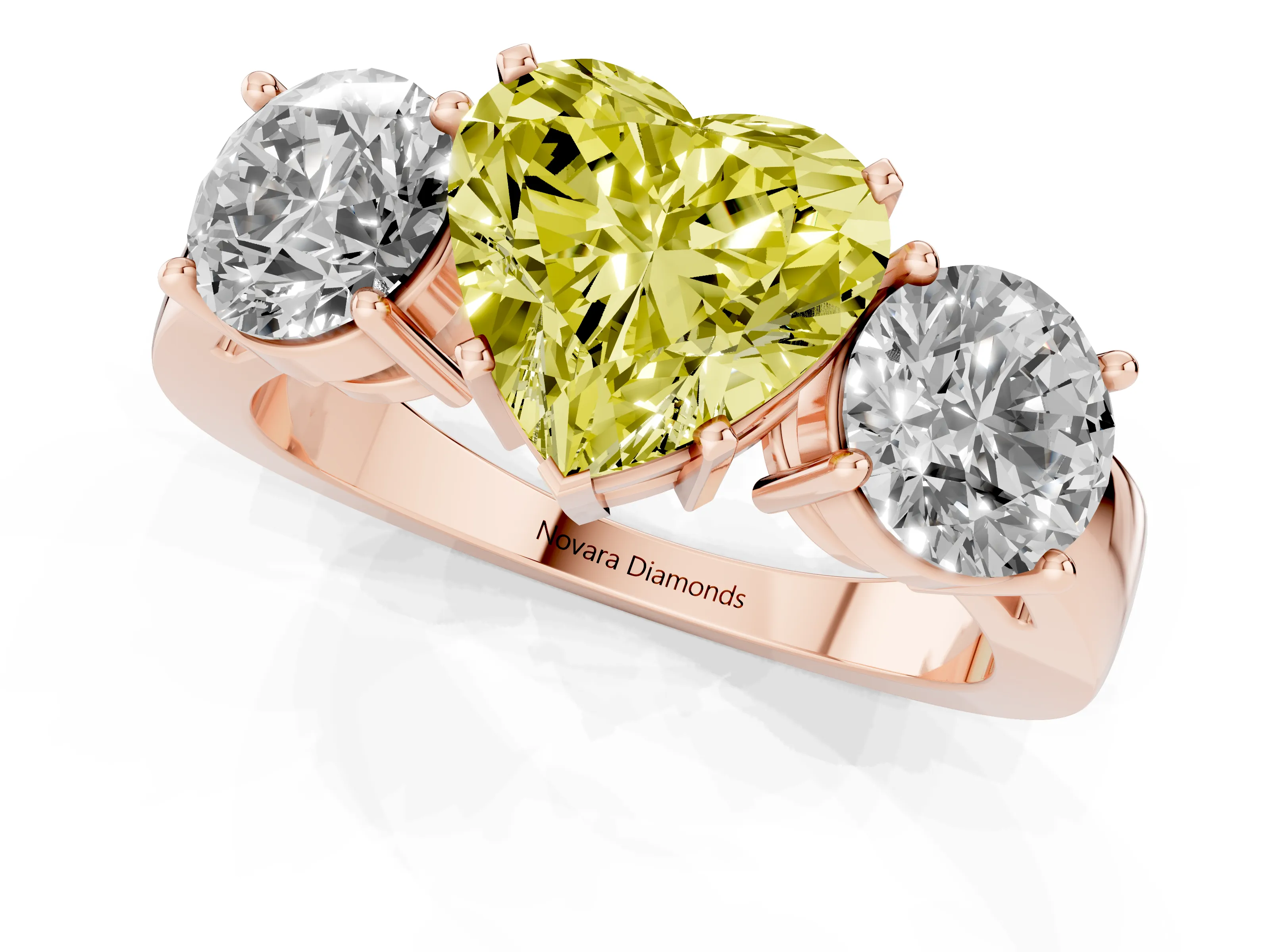 Fancy Yellow Heart Cut Diamond Three-Stone Ring Set in Rose gold with Round Side Stones and Classic Band