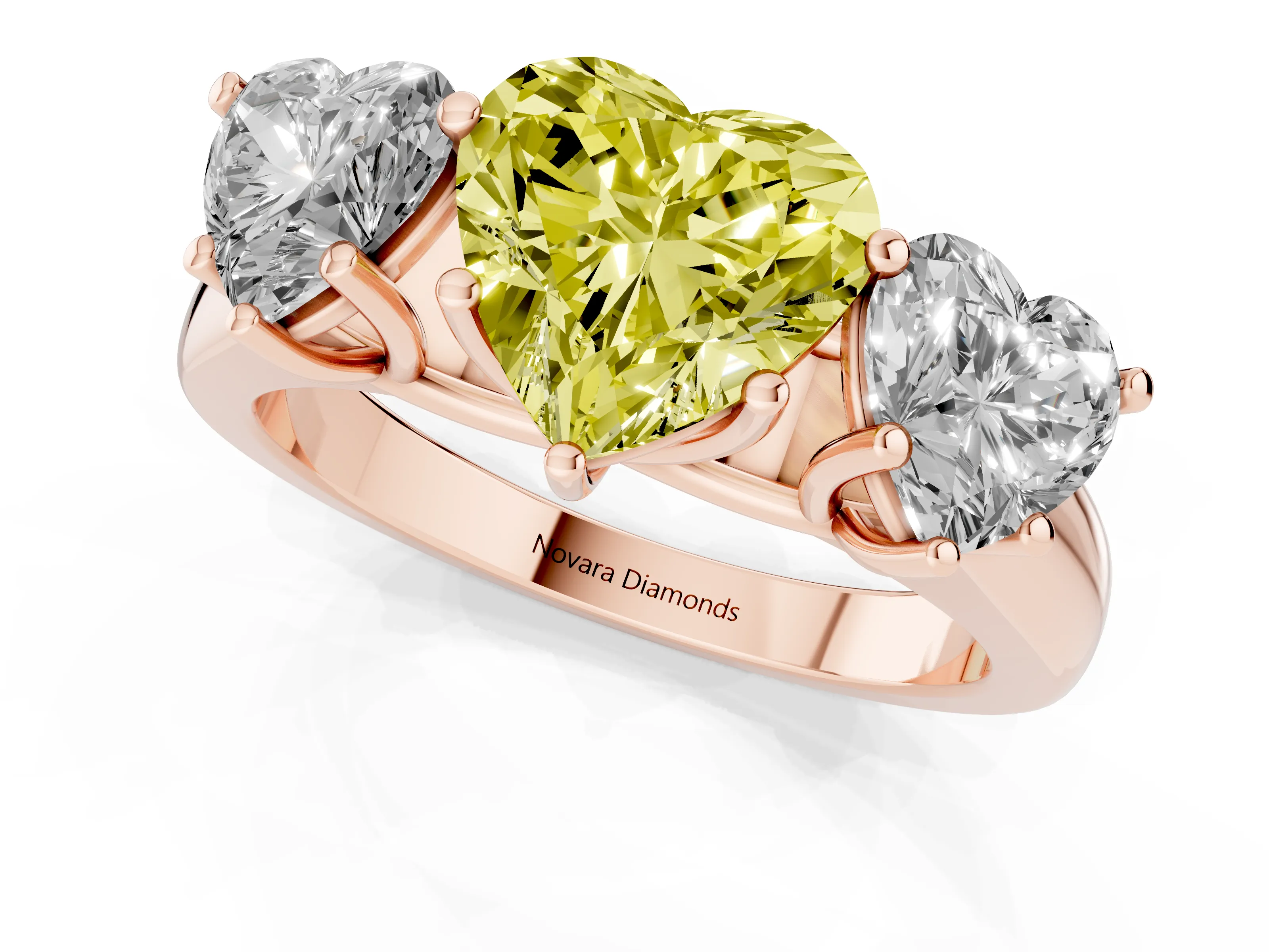 Fancy Yellow Heart Cut Diamond Three-Stone Ring Set in Rose gold with Plain Polished Band