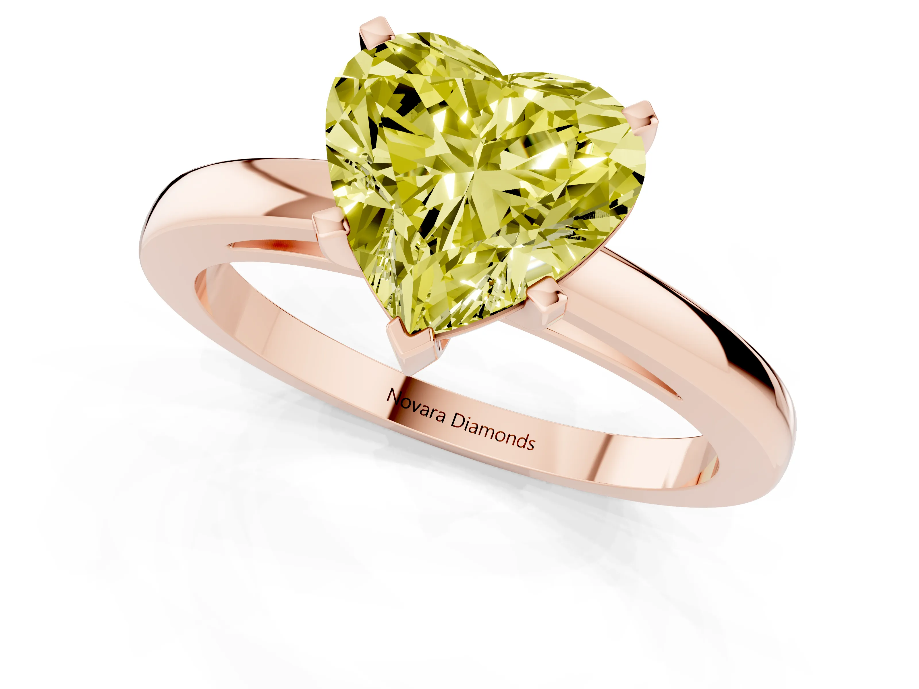Fancy Yellow Heart Cut Diamond Solitaire Engagement Ring Set in Rose gold with Prong Setting on a Classic Band