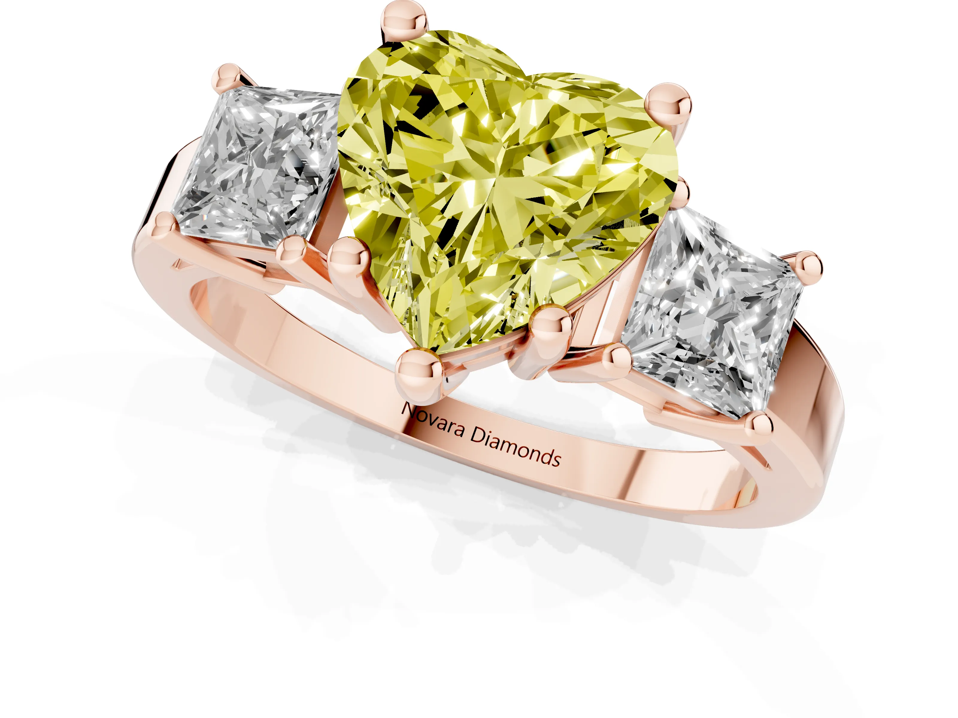 Fancy Yellow Three-Stone Heart Cut Diamond Solitaire Ring Set in Rose gold with Prong Setting