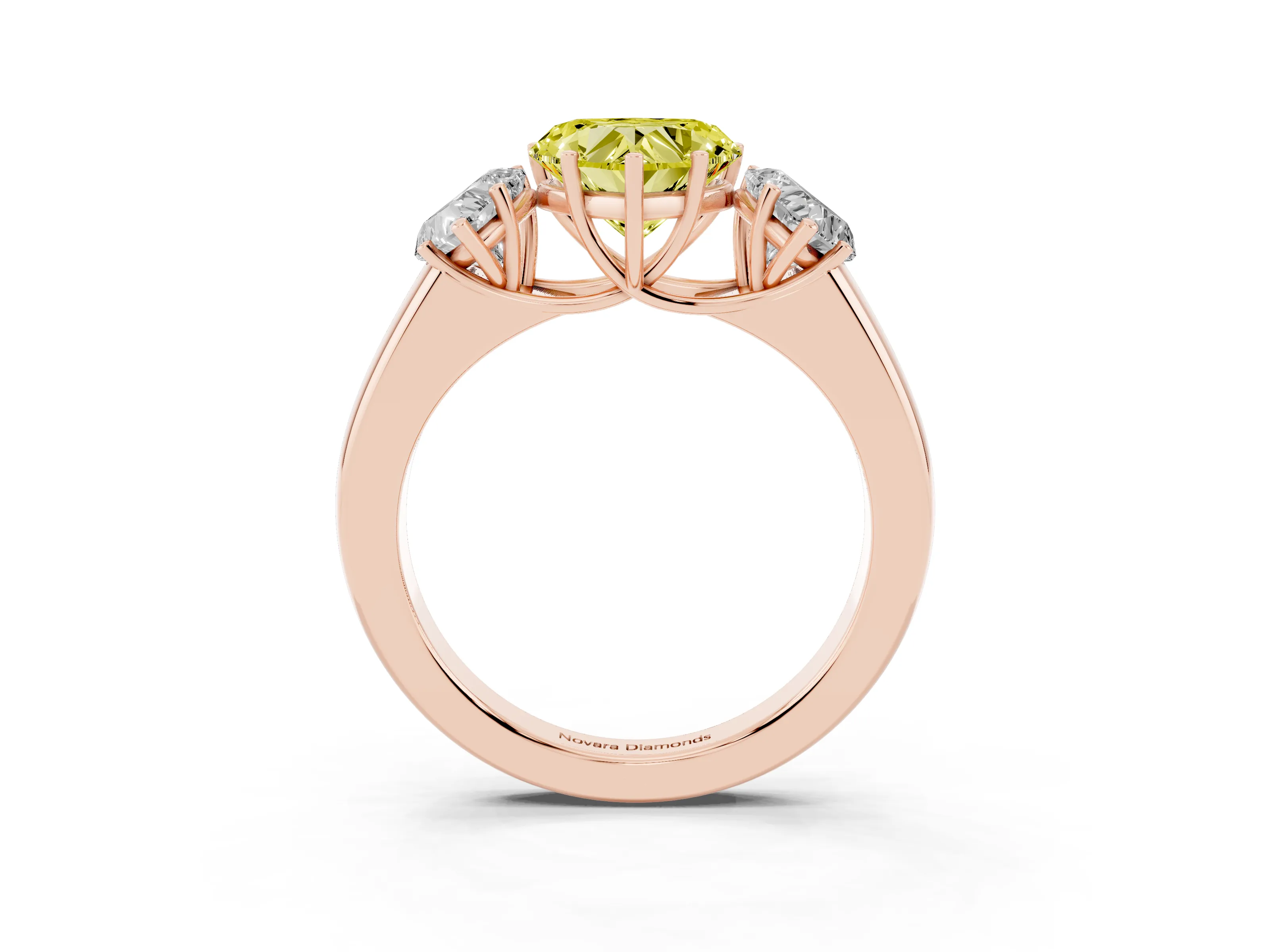 Fancy Yellow Three-Stone Heart Cut Diamond Ring Set in Rose gold with Matching Prong Settings and Plain Band
