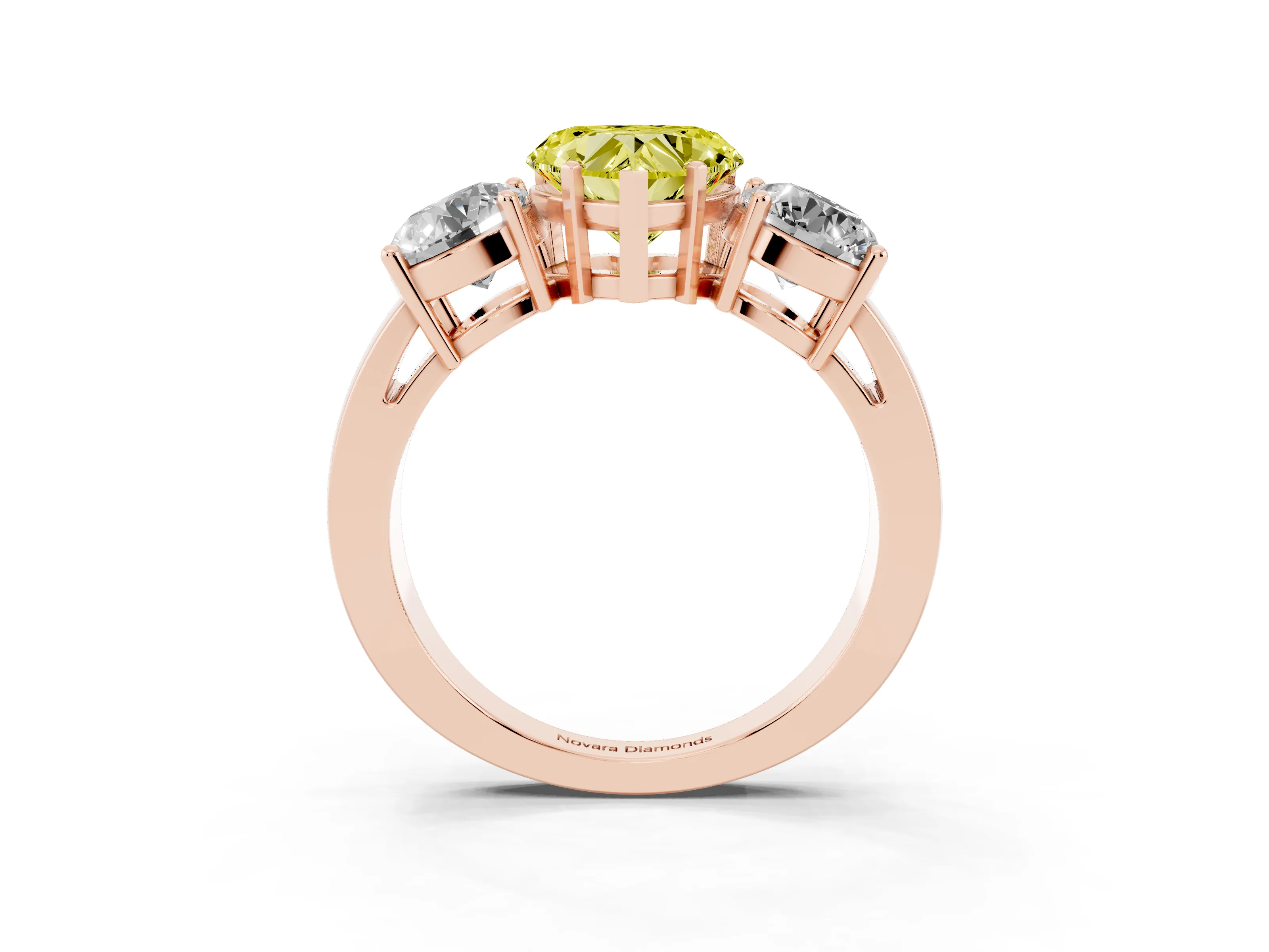 Fancy Yellow Heart Cut Diamond Three-Stone Ring Set in Rose gold with Round Side Stones and Classic Band