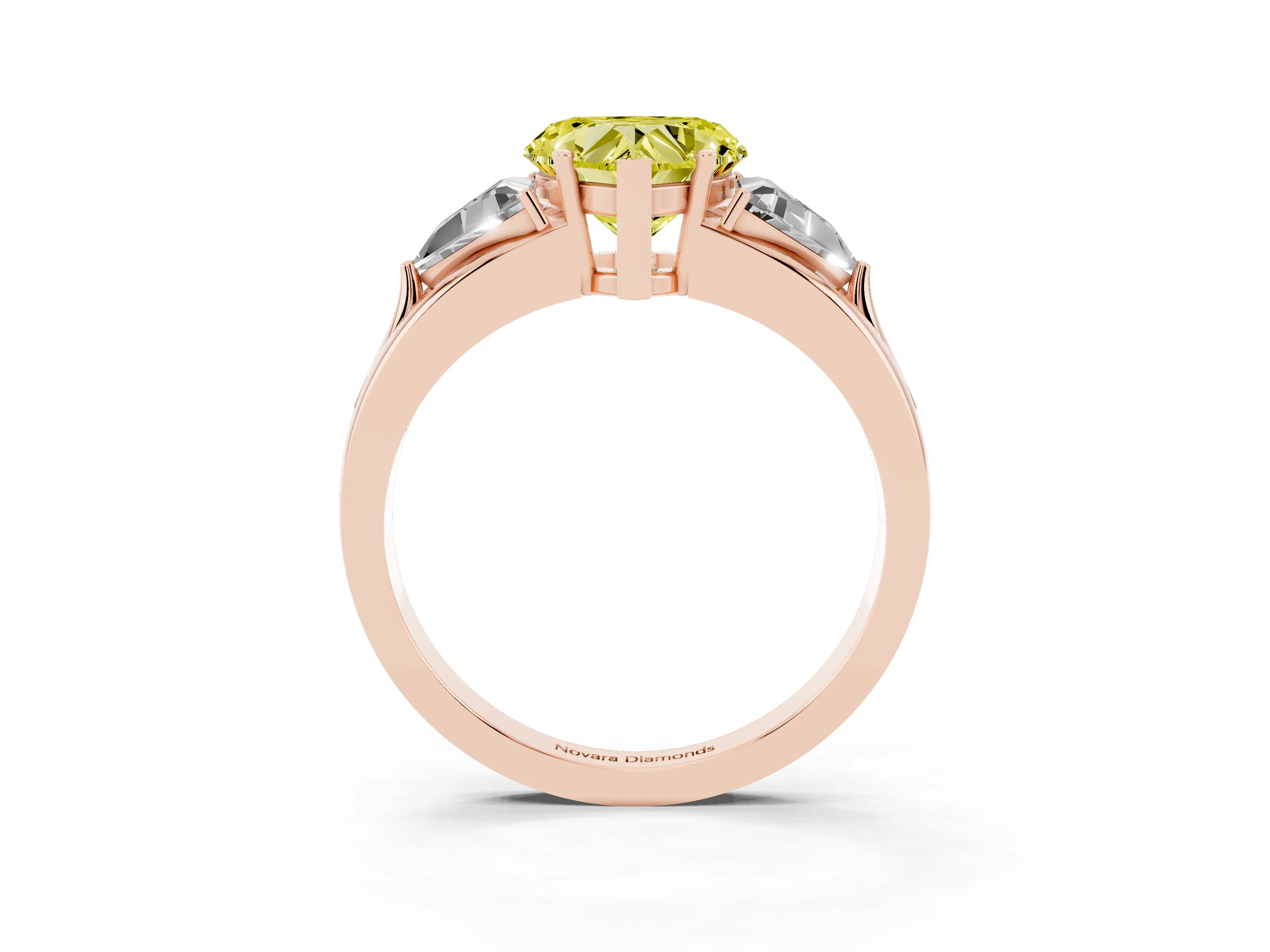 Fancy Yellow Heart Cut Diamond Three-Stone Ring Set in Rose gold with Trillion Side Stones and Split Shank