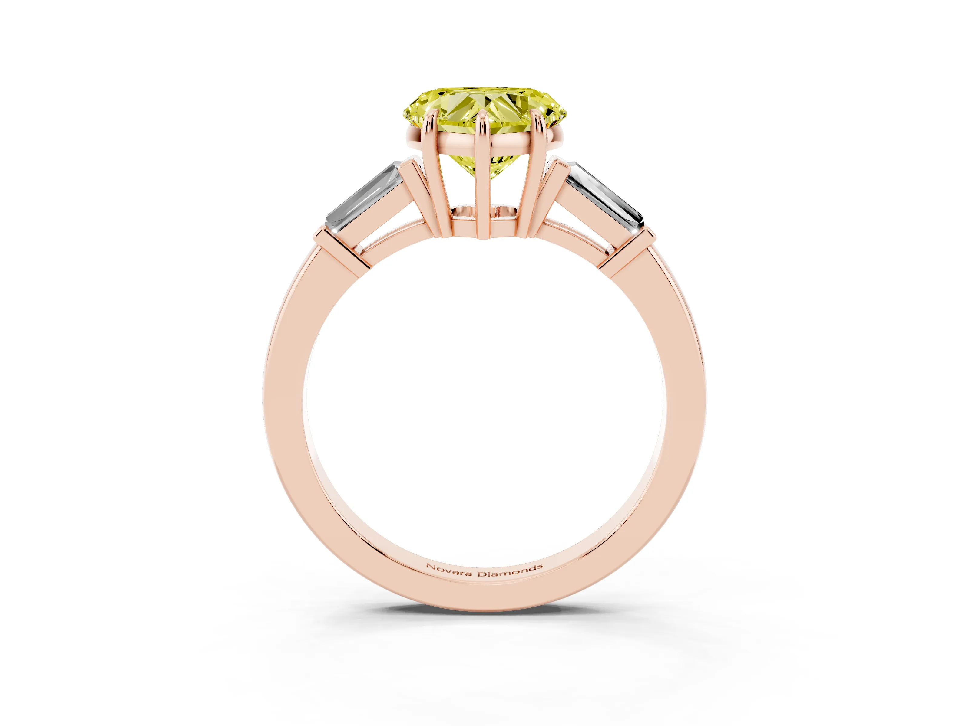 Fancy Yellow Heart Cut Diamond Three-Stone Ring Set in Rose gold with Tapered Baguette Side Stones and Prong Setting