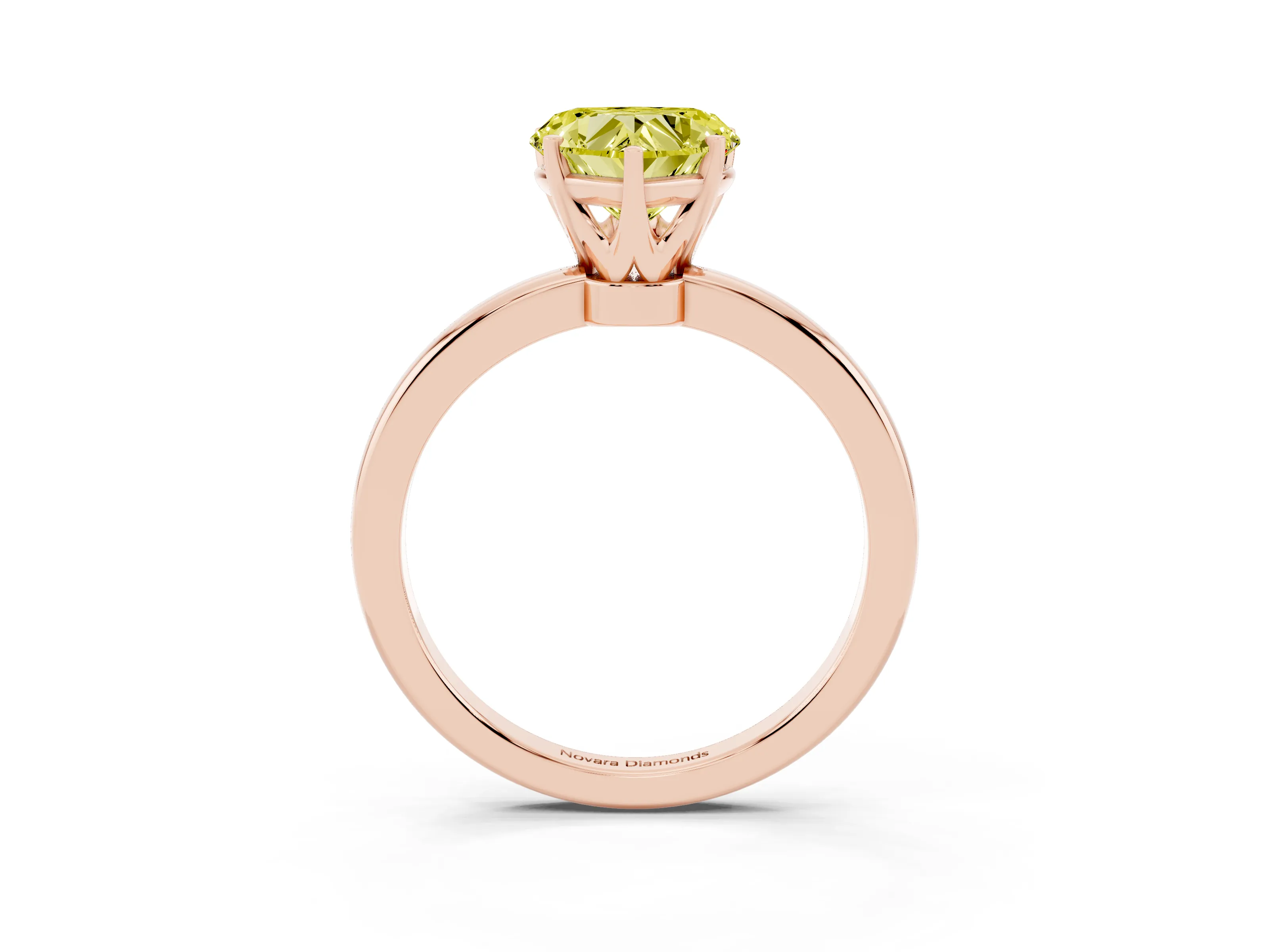 Fancy Yellow Heart Cut Diamond Solitaire Ring Set in Rose gold with Raised Prong Setting on a Classic Band