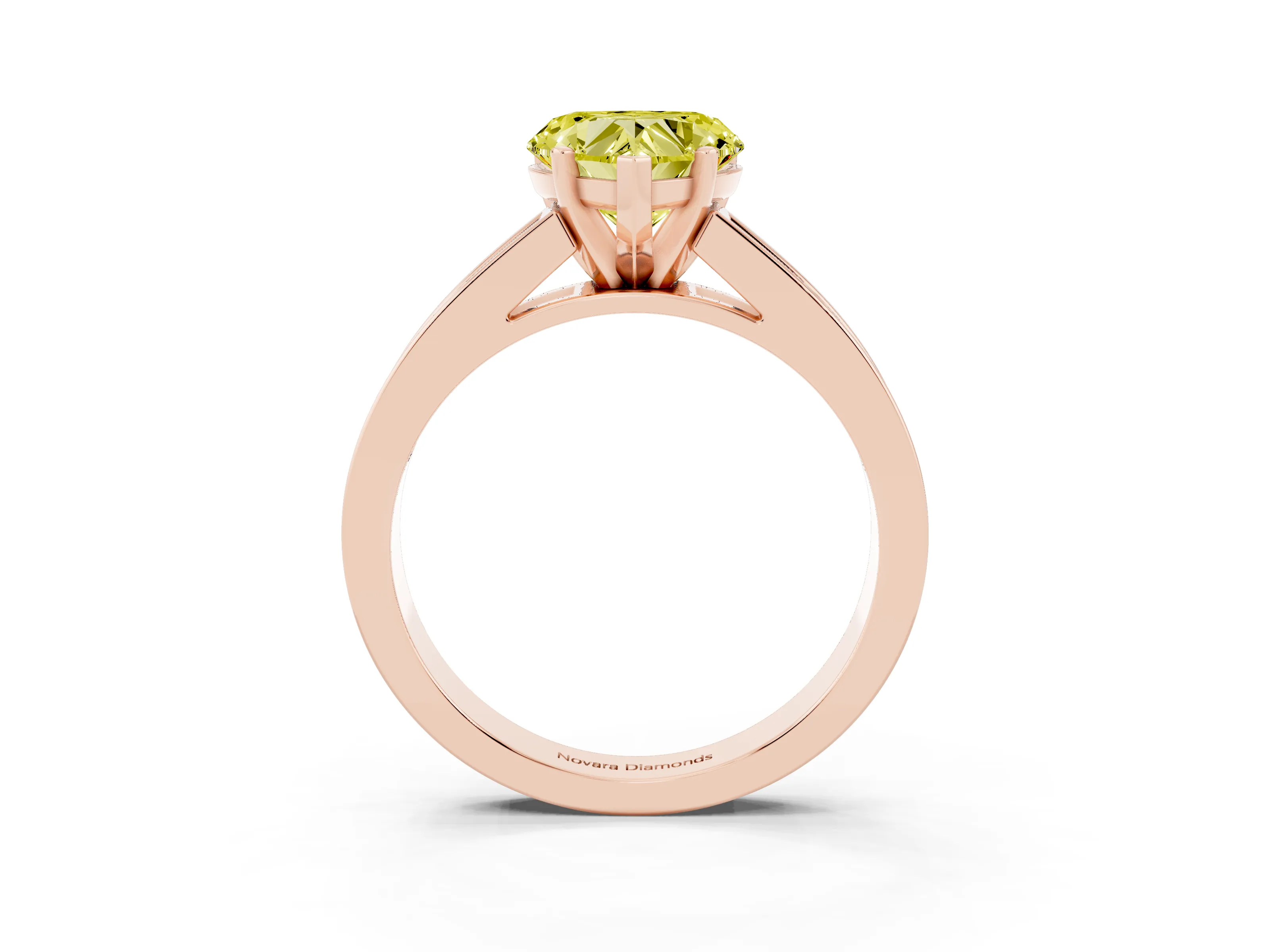 Fancy Yellow Heart Cut Diamond Solitaire Ring Set in Rose gold with Channel-Set Band and Prong Setting
