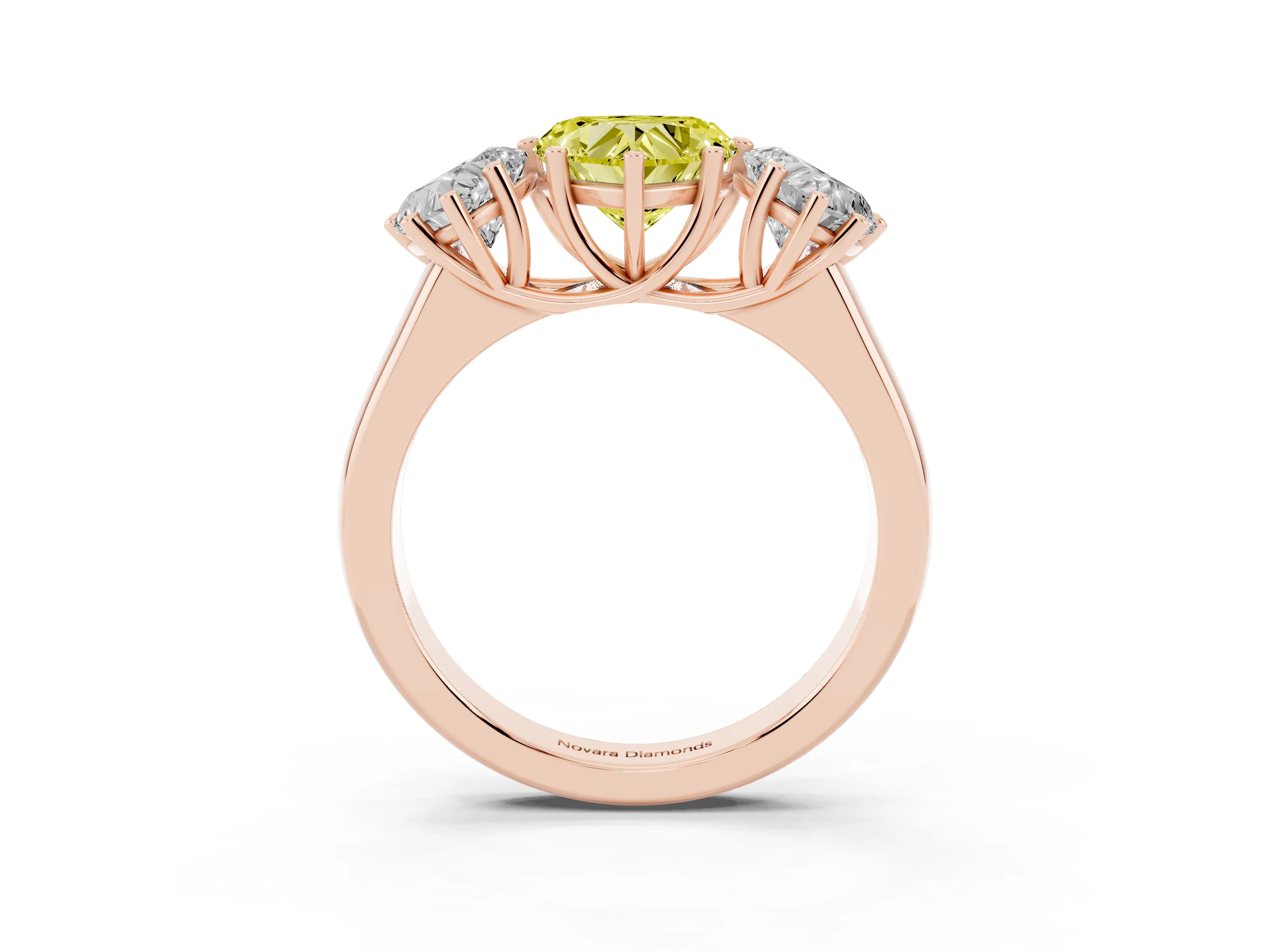 Fancy Yellow Heart Cut Diamond Three-Stone Ring Set in Rose gold with Plain Polished Band