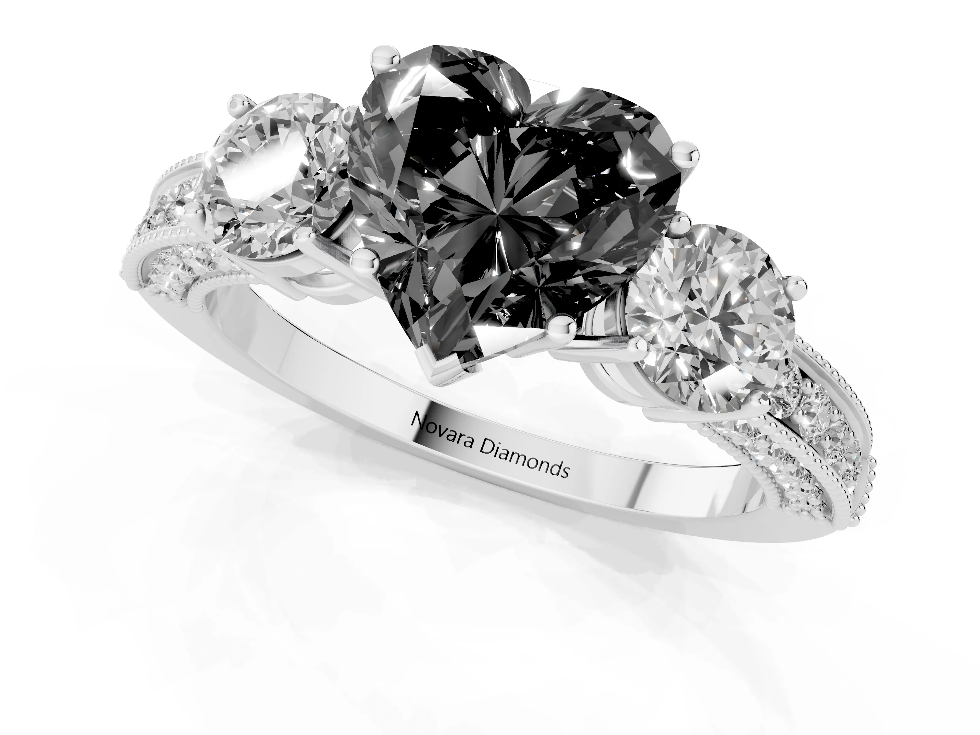 Fancy Black Heart Cut Diamond Three-Stone Ring Set in White gold with Round Side Stones and Pavé Band