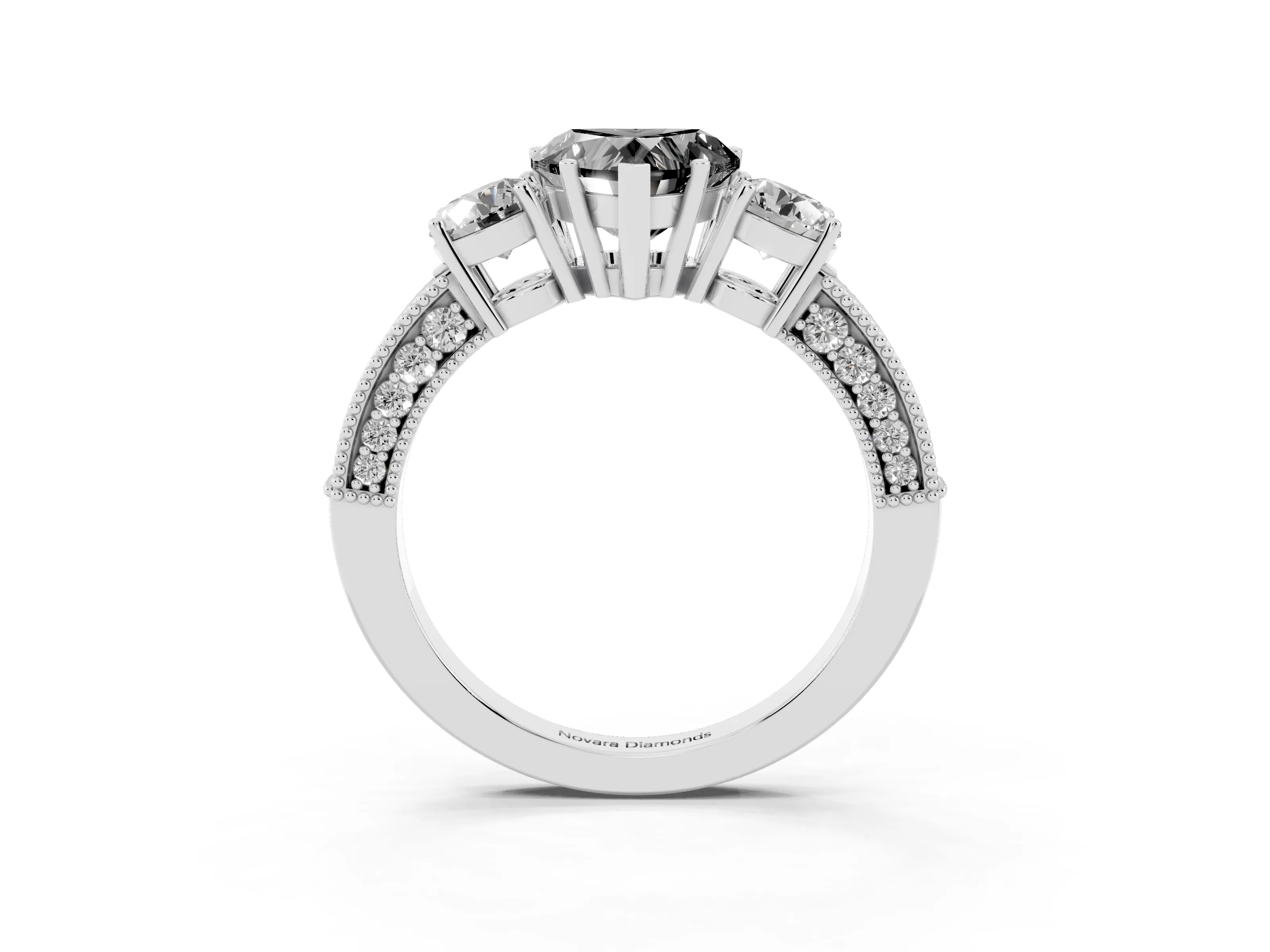 Fancy Black Heart Cut Diamond Three-Stone Ring Set in White gold with Round Side Stones and Pavé Band