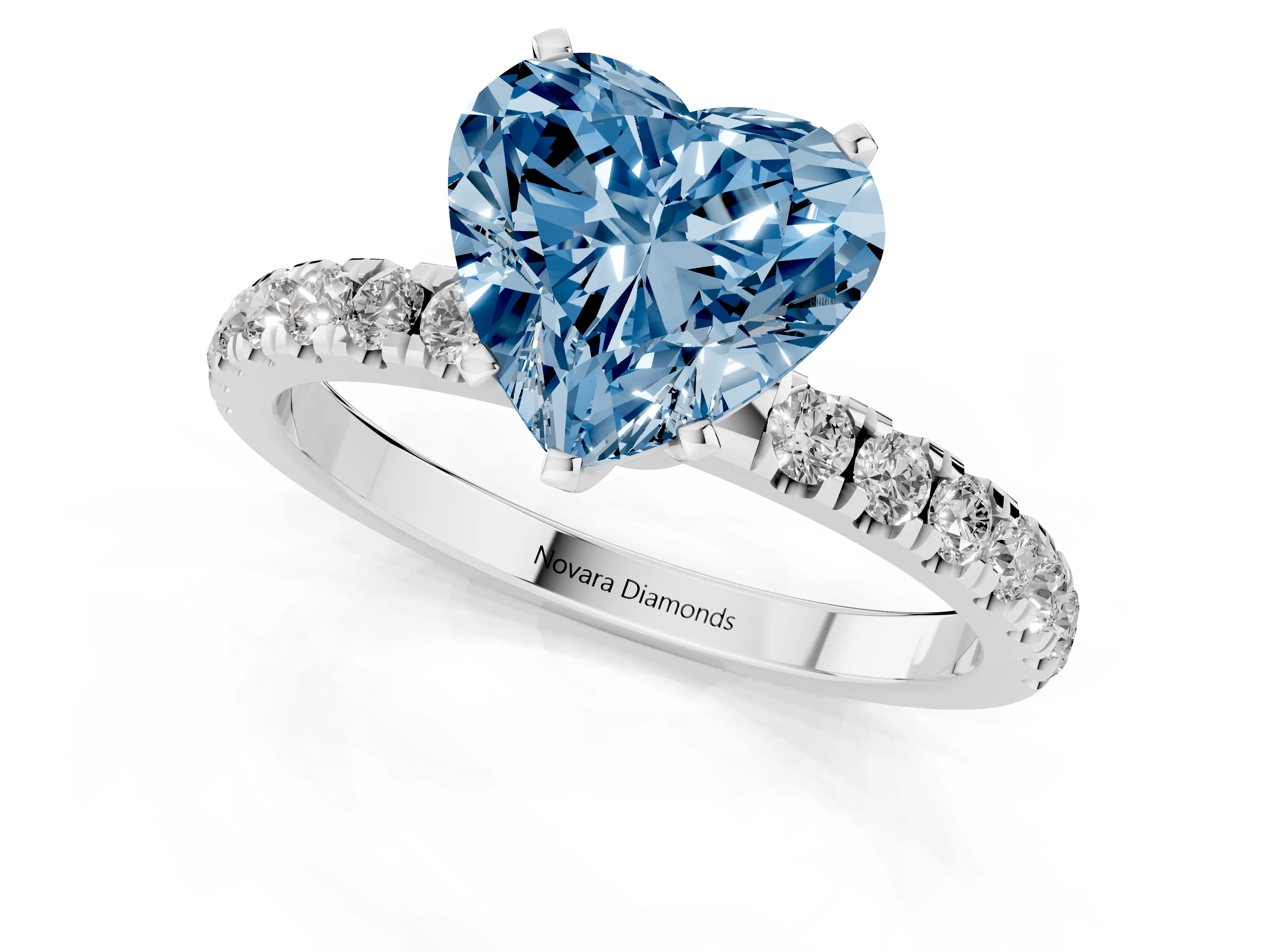 Fancy Blue Heart Cut Diamond Solitaire Ring Set in White gold with Pavé Accents and Prong Setting