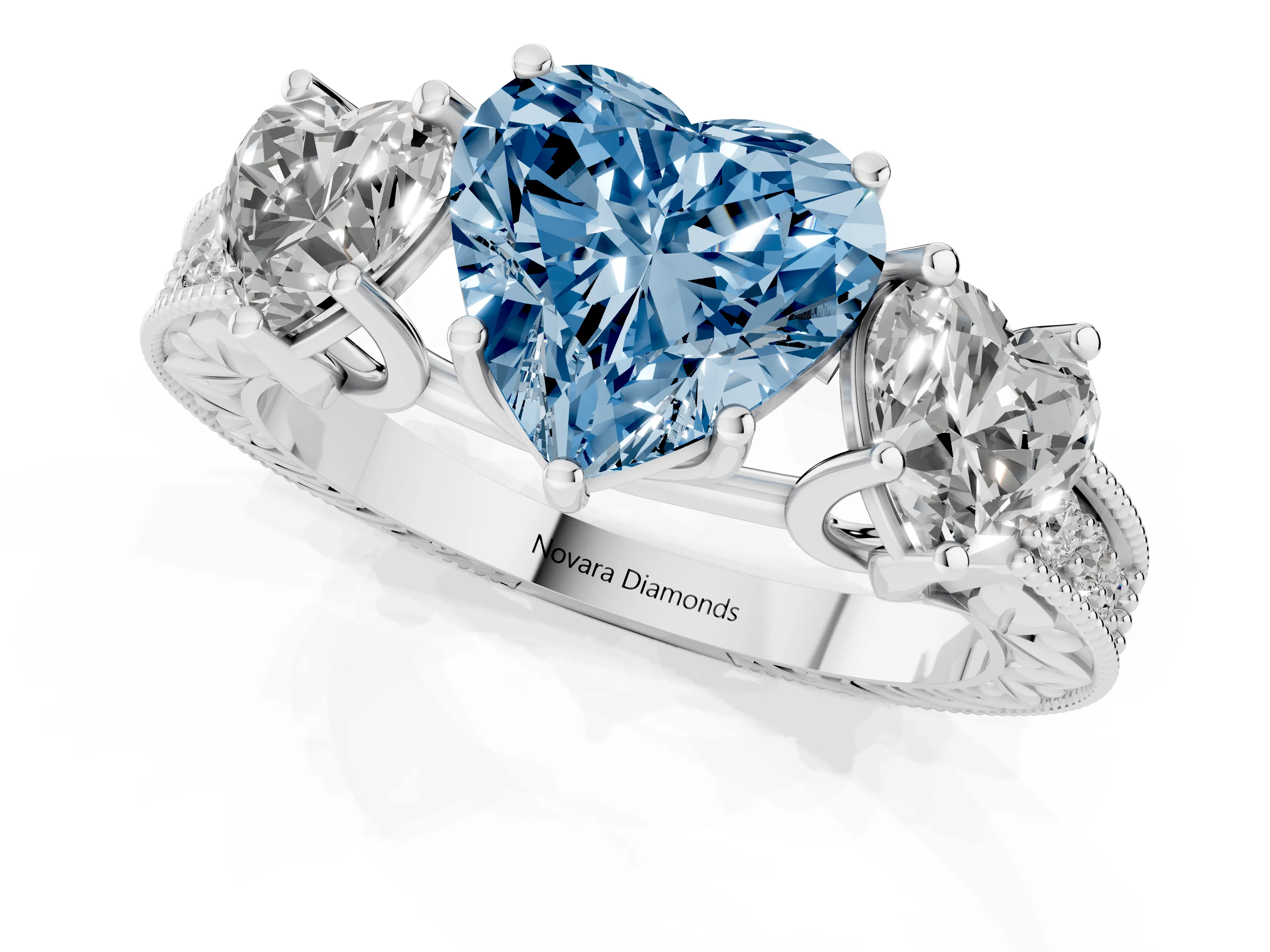 Fancy Blue Heart Cut Diamond Three-Stone Engagement Ring Set in Platinum with Milgrain Pavé Band