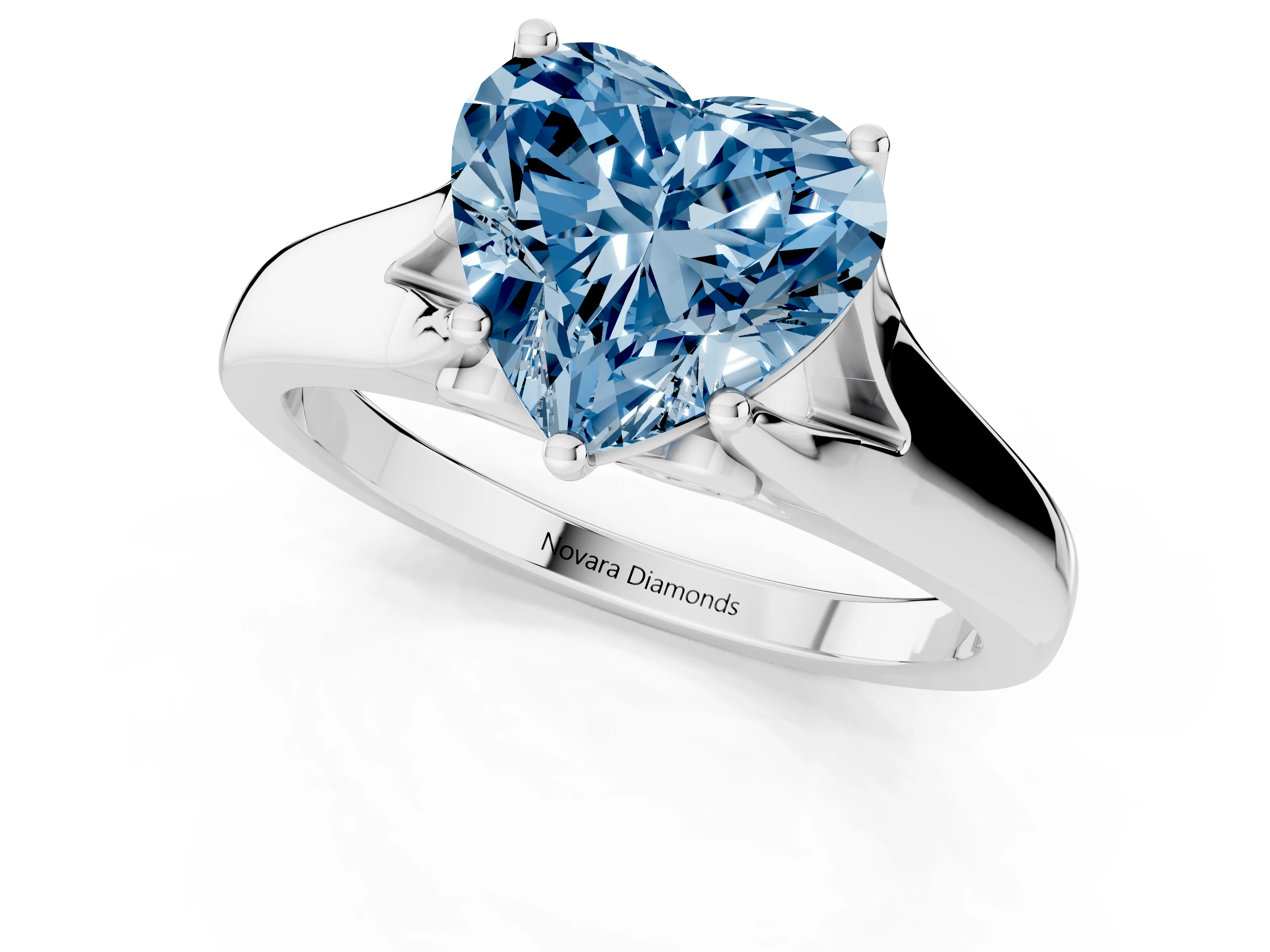 Fancy Blue Heart Cut Diamond Solitaire Ring Set in White gold with Arched Cathedral Band and Prong Setting