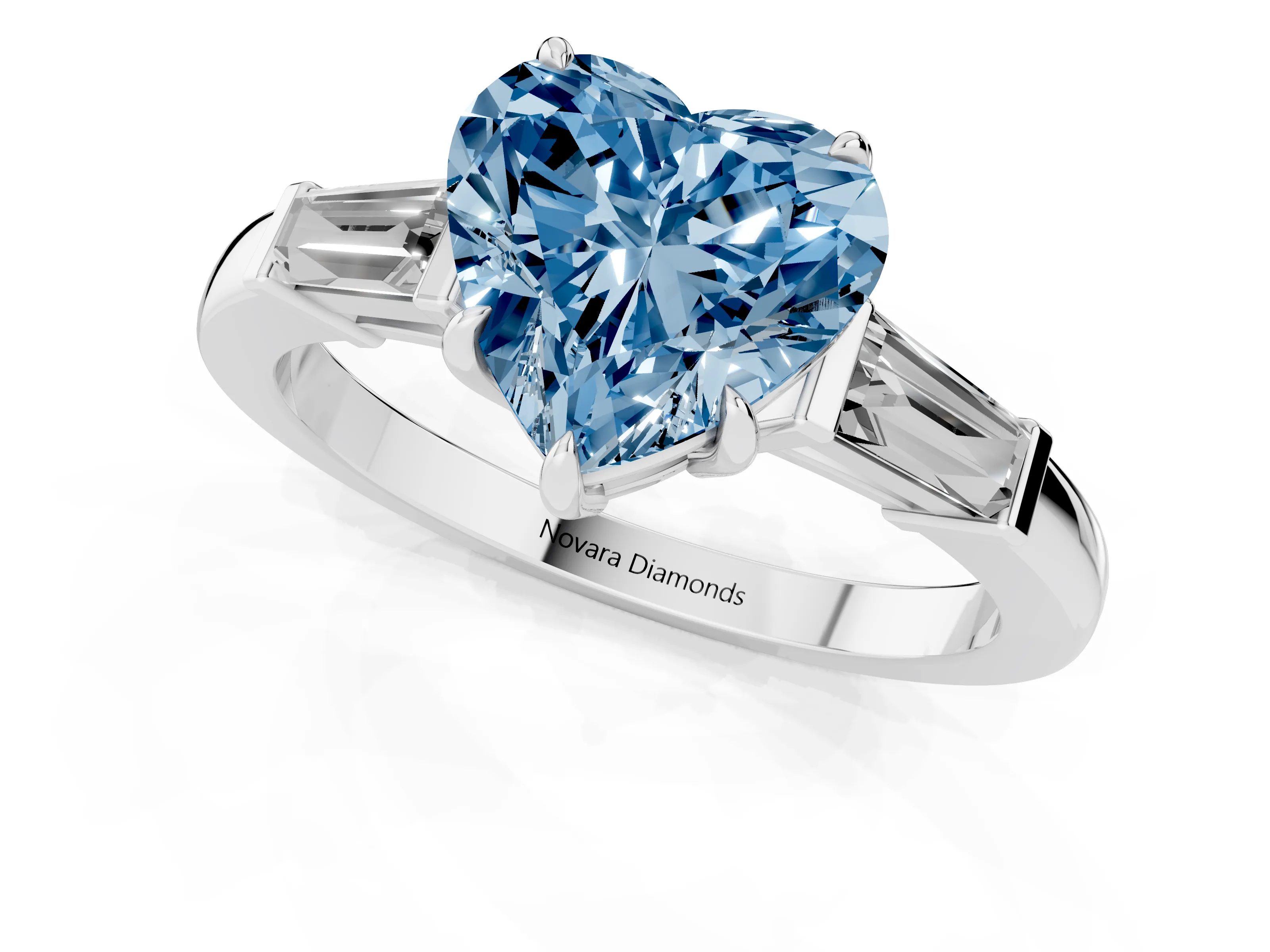 Fancy Blue Heart Cut Diamond Three-Stone Ring Set in Platinum with Tapered Baguette Side Stones and Prong Setting