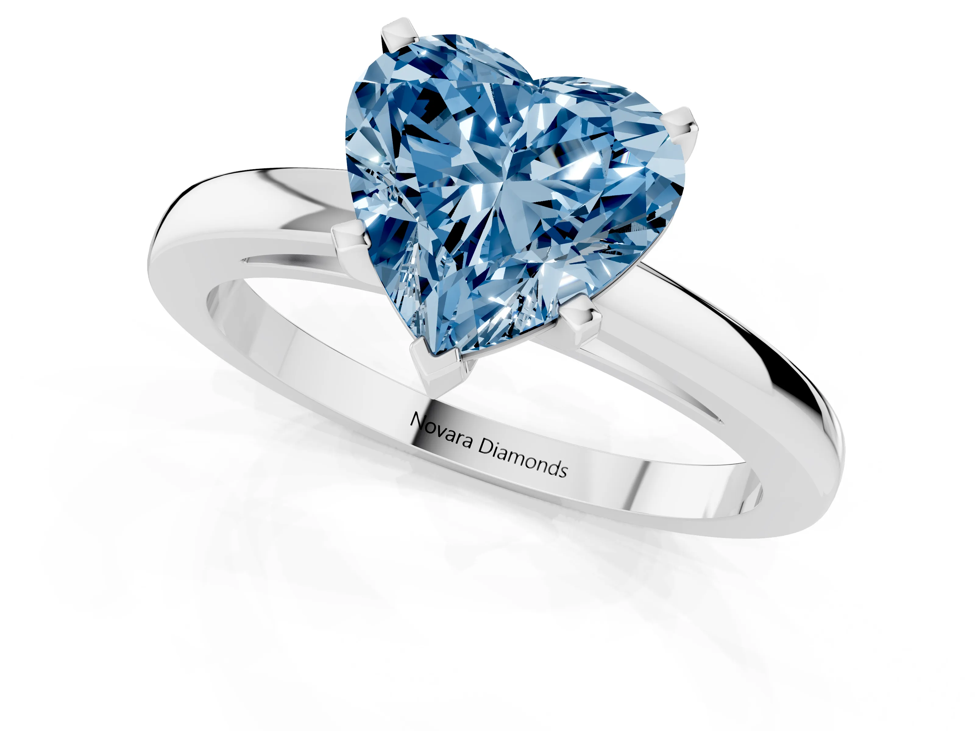 Fancy Blue Heart Cut Diamond Solitaire Engagement Ring Set in White gold with Prong Setting on a Classic Band