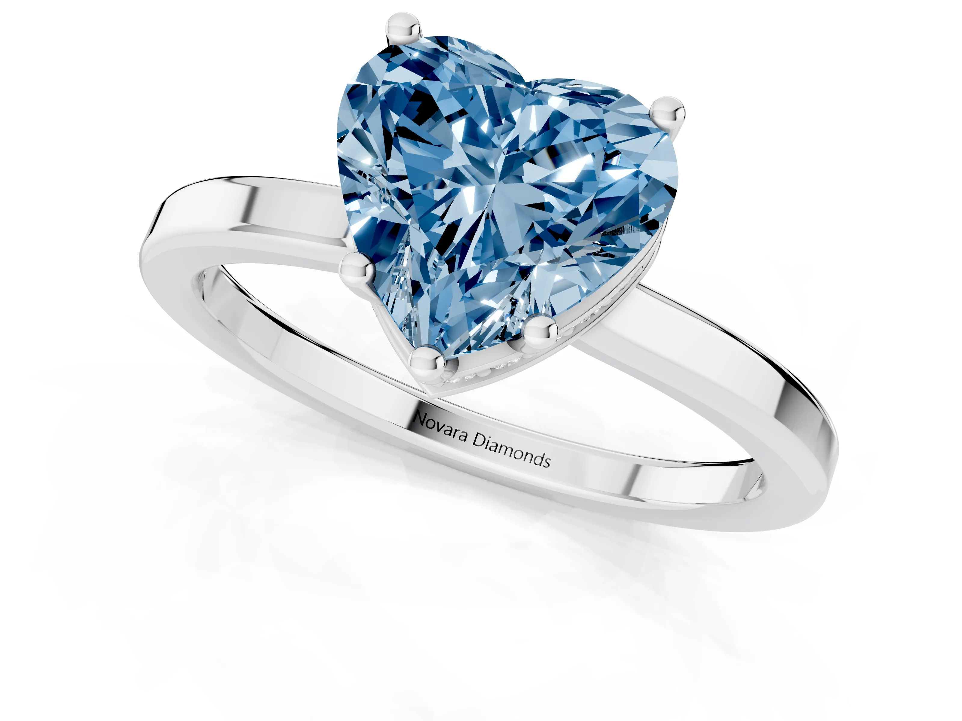Fancy Blue Heart Cut Diamond Solitaire Engagement Ring Set in Platinum with Prong Setting on a Plain Band