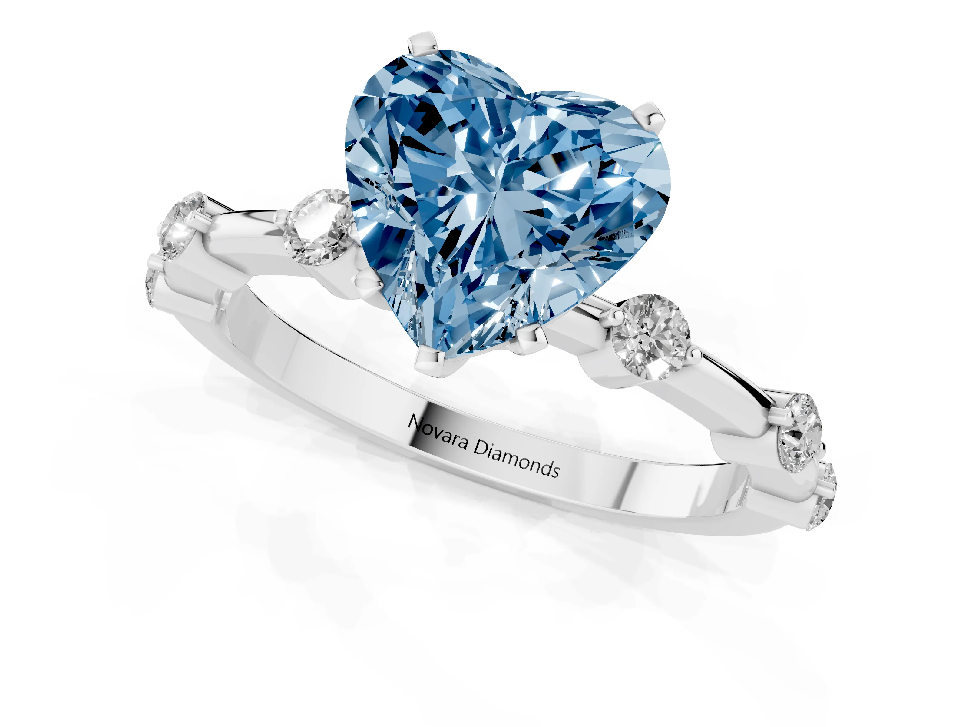 Fancy Blue Heart Cut Diamond Solitaire Ring Set in White gold with Bezel Set Side Stones and Prong Setting