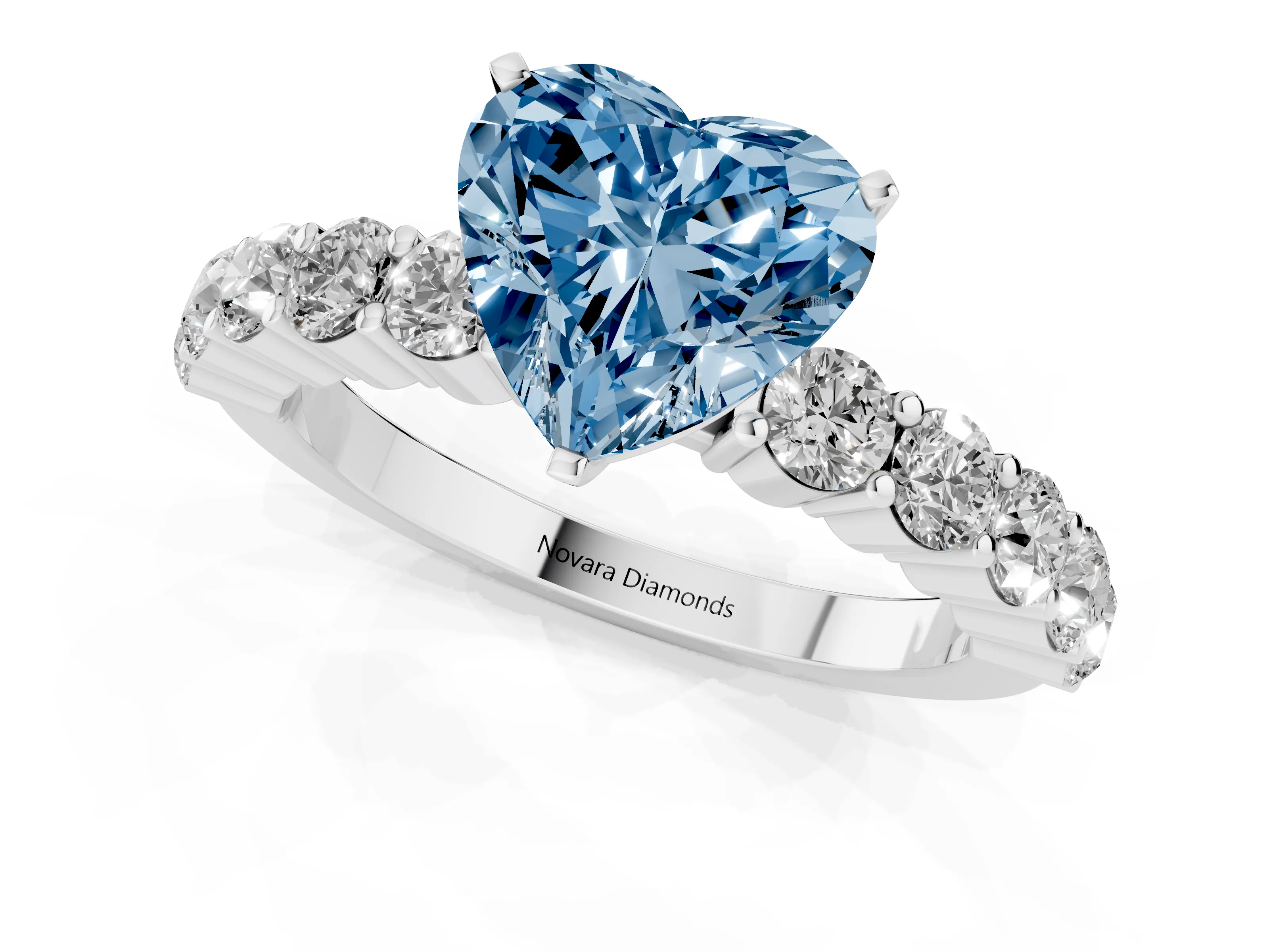 Fancy Blue Heart Cut Diamond Solitaire Ring Set in White gold with Shared Prong Round Side Stones