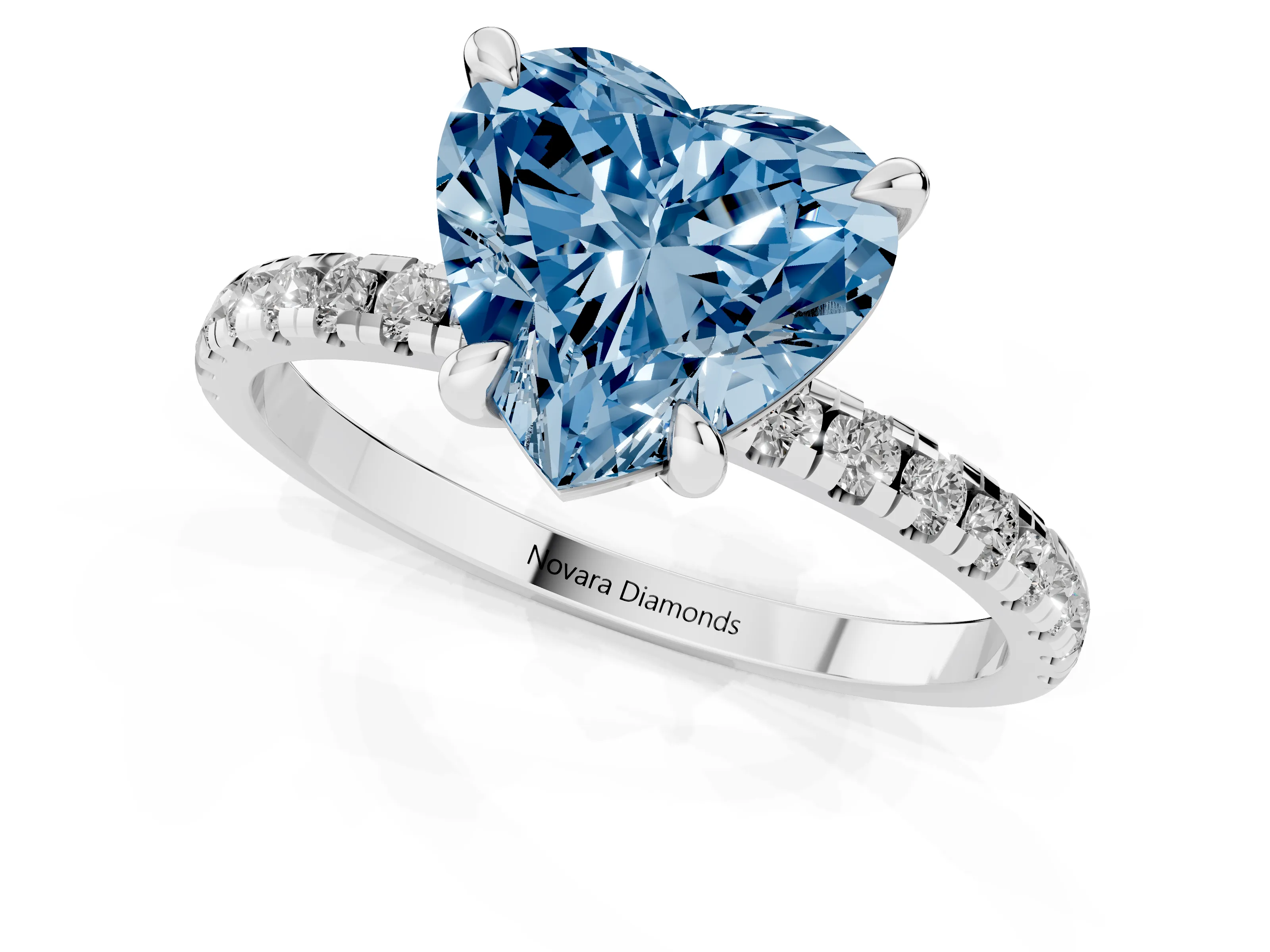 Fancy Blue Heart Cut Diamond Brilliant Solitaire Ring Set in White gold with Pavé Band and Prong Setting