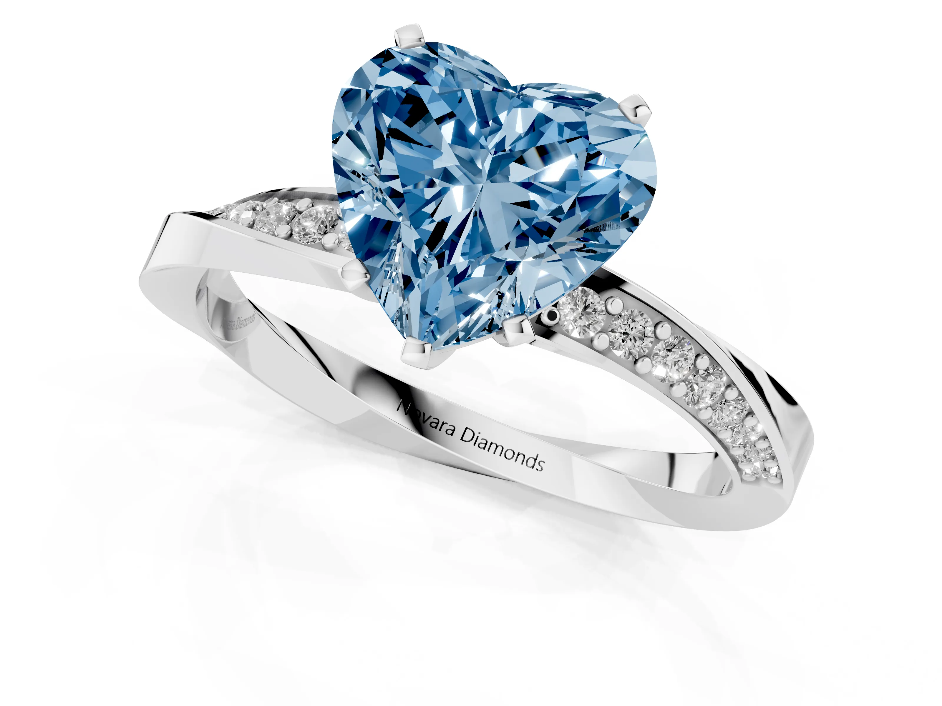 Fancy Blue Heart Cut Diamond Engagement Ring Set in White gold with Side Stone Accents and Prong Setting