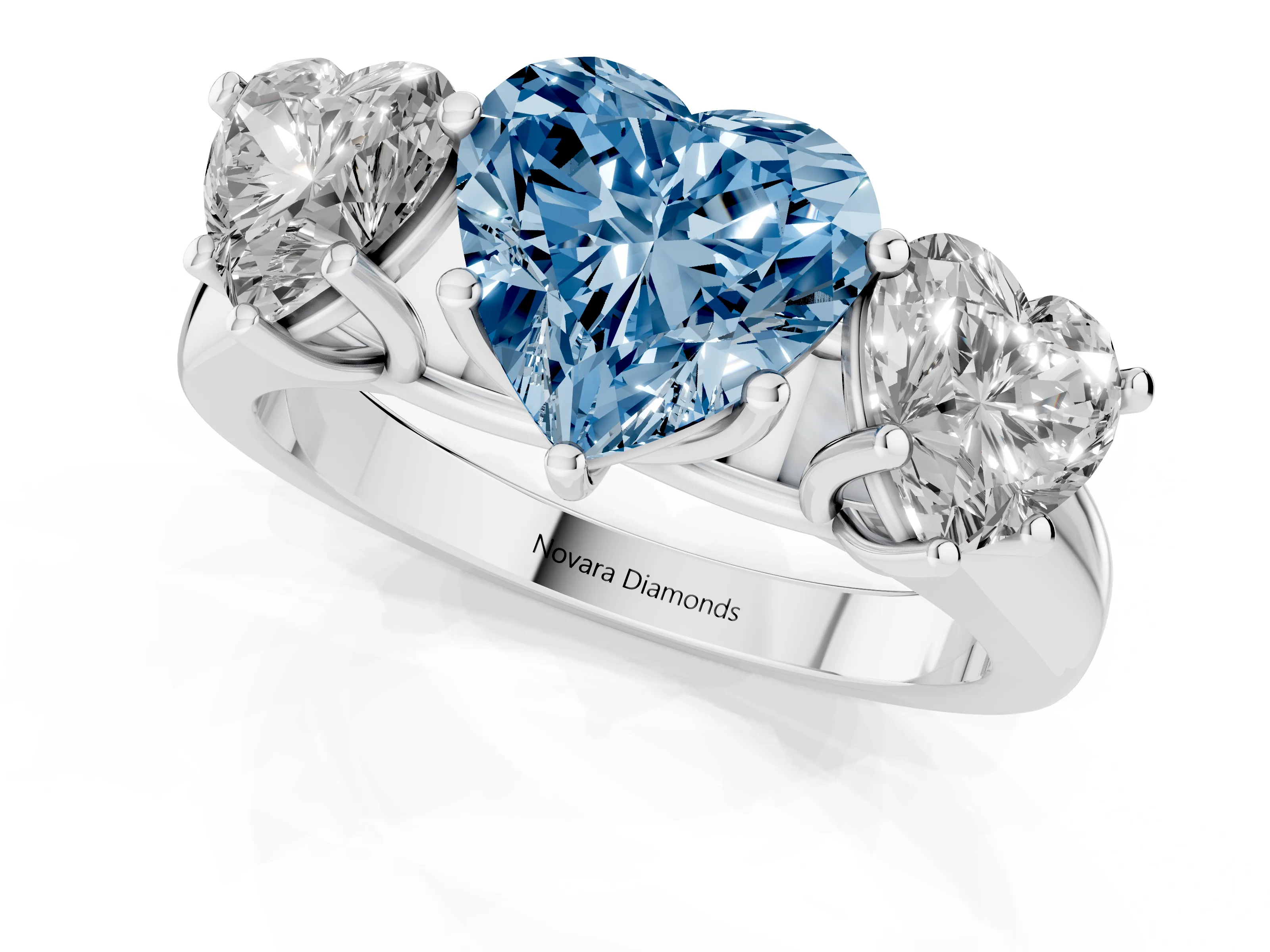 Fancy Blue Heart Cut Diamond Three-Stone Ring Set in Platinum with Plain Polished Band