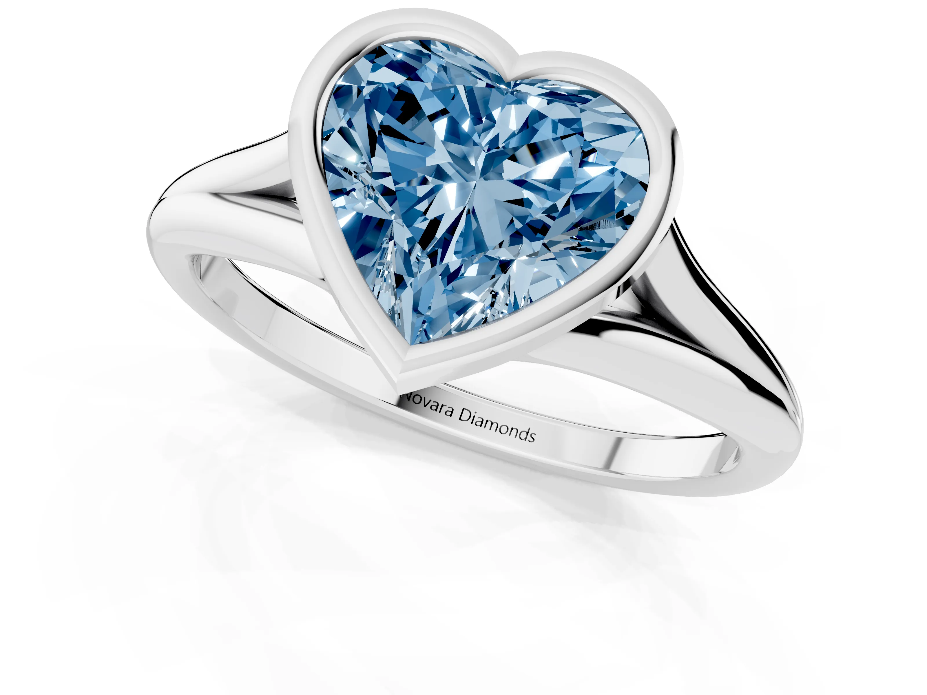 Fancy Blue Bezel Set Heart Cut Diamond Solitaire Ring Set in Platinum with Tapered Band