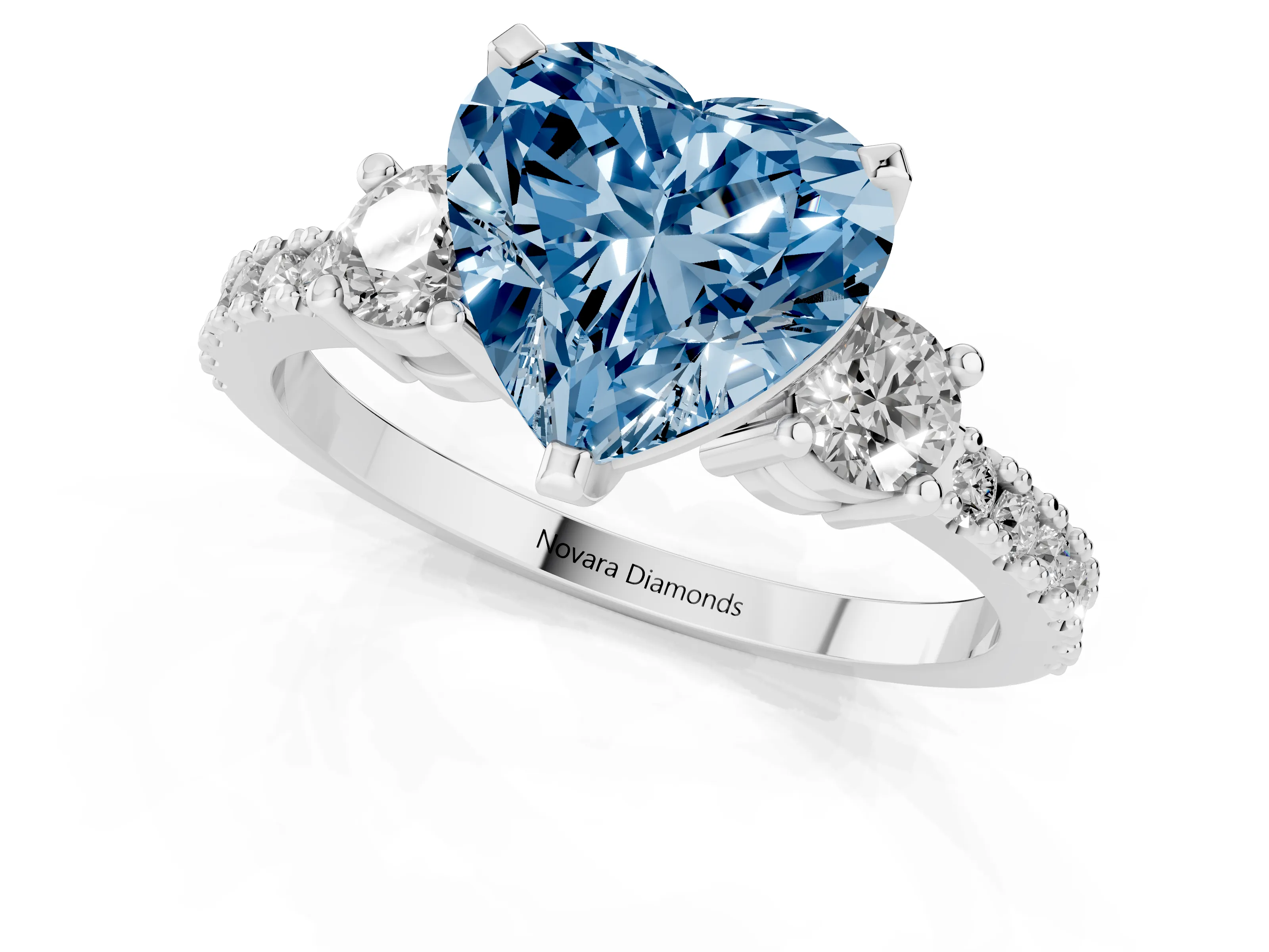 Fancy Blue Three-Stone Heart Cut Diamond Pavé Band Ring Set in Silver with Prong Setting