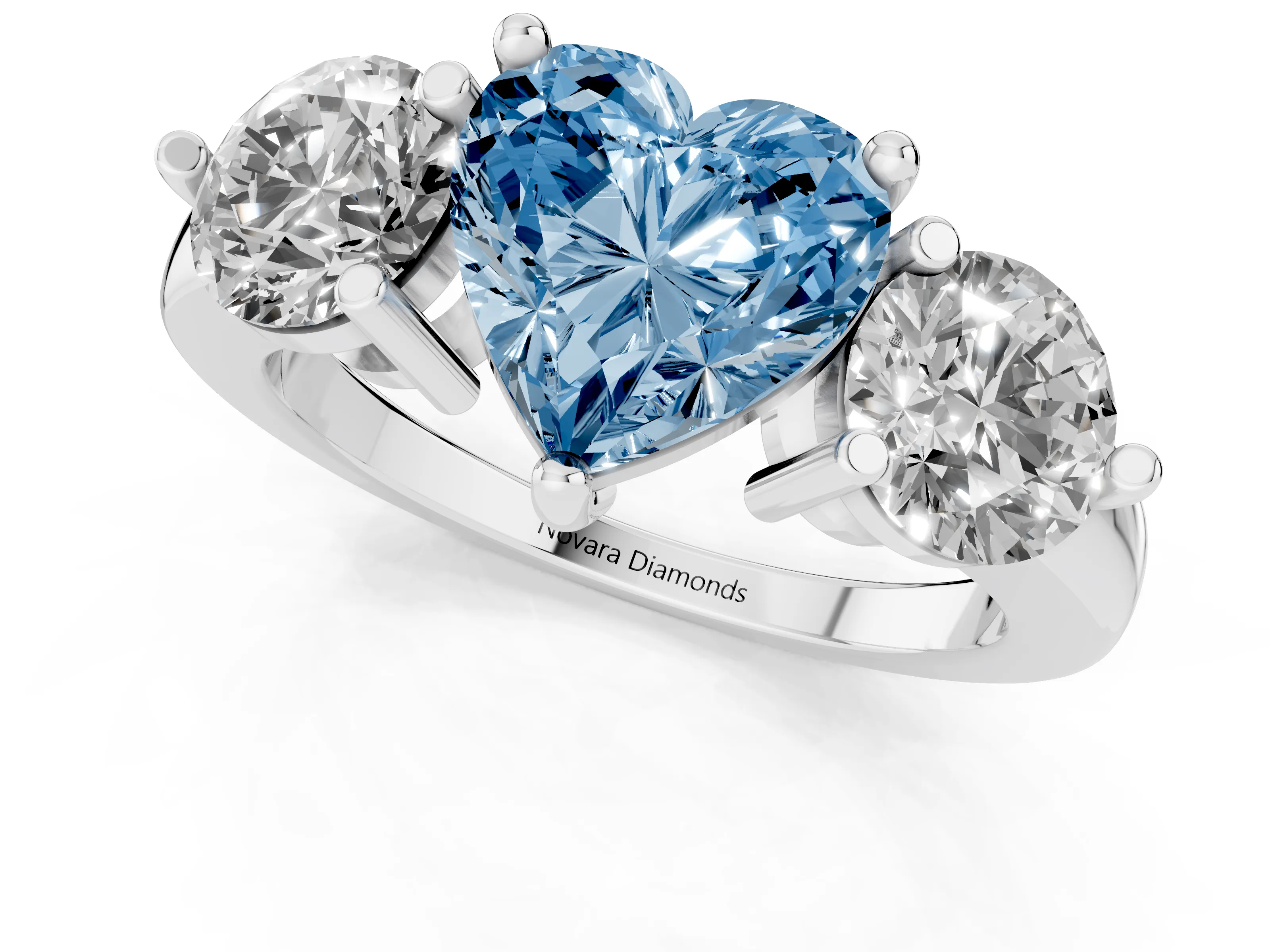 Fancy Blue Heart Cut Diamond Three-Stone Ring Set in Silver with Prong Setting and Classic Band