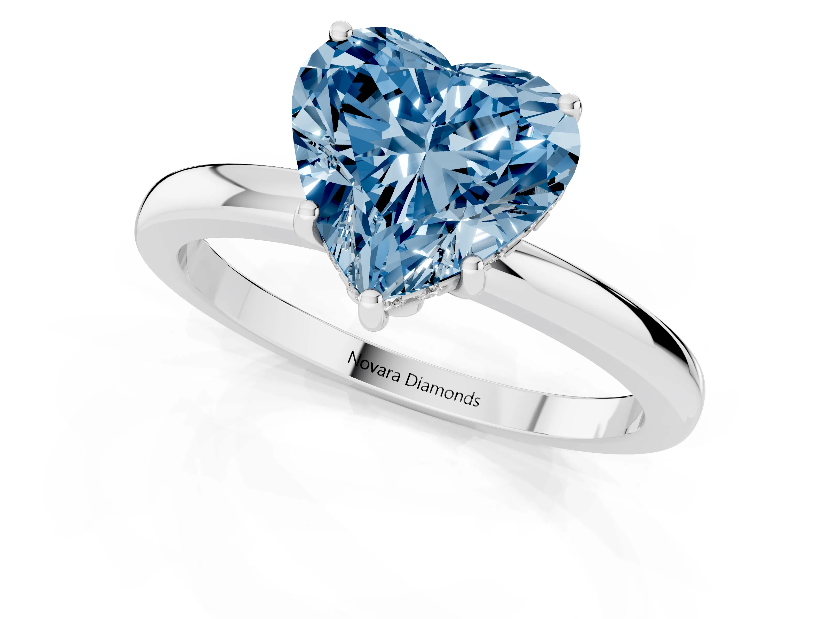 Fancy Blue Heart Cut Diamond Solitaire Ring Set in White gold with Plain Band and Prong Setting
