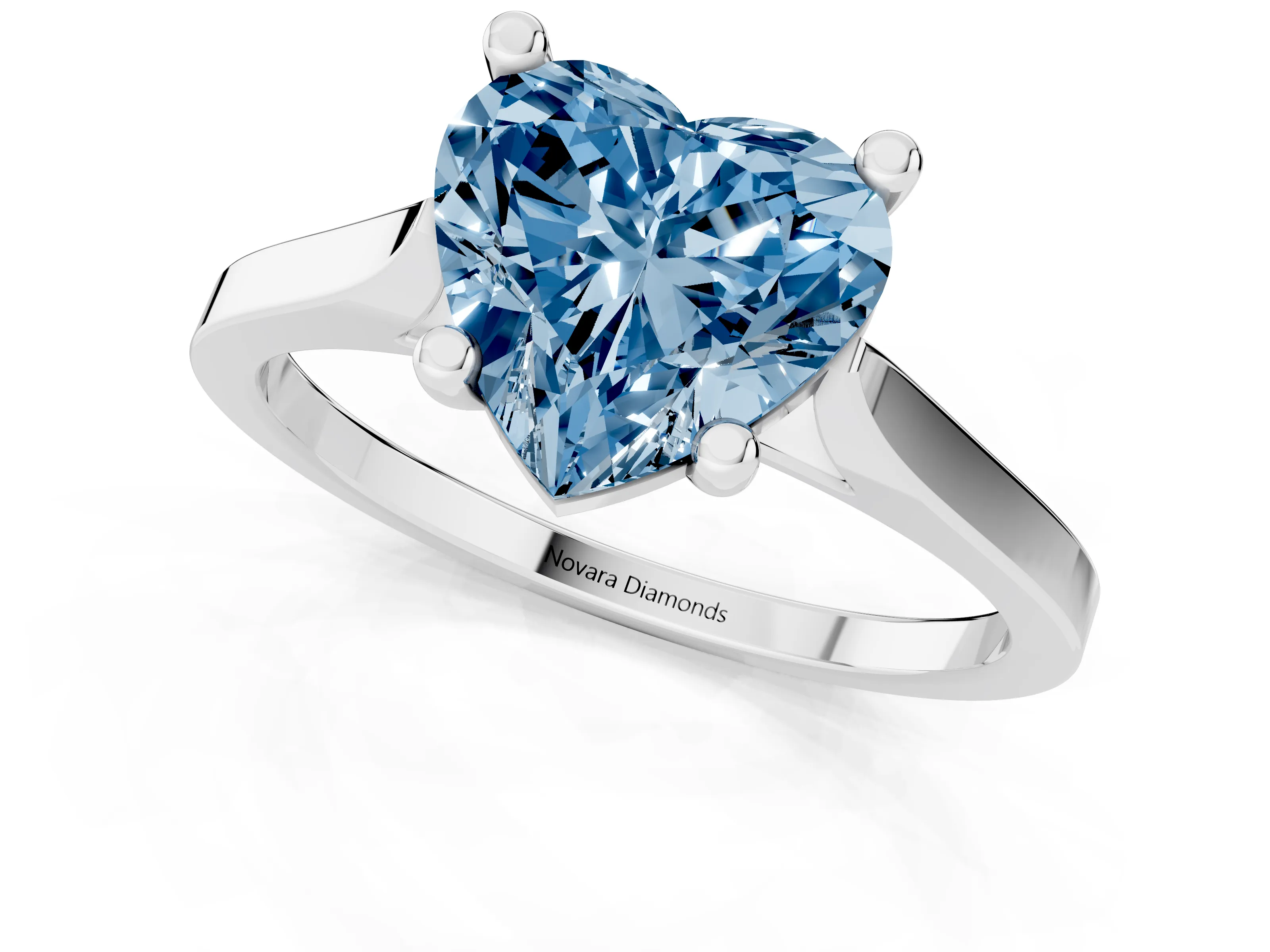 Fancy Blue Heart Cut Diamond Solitaire Ring Set in Platinum with Prong Setting and Tapered Band