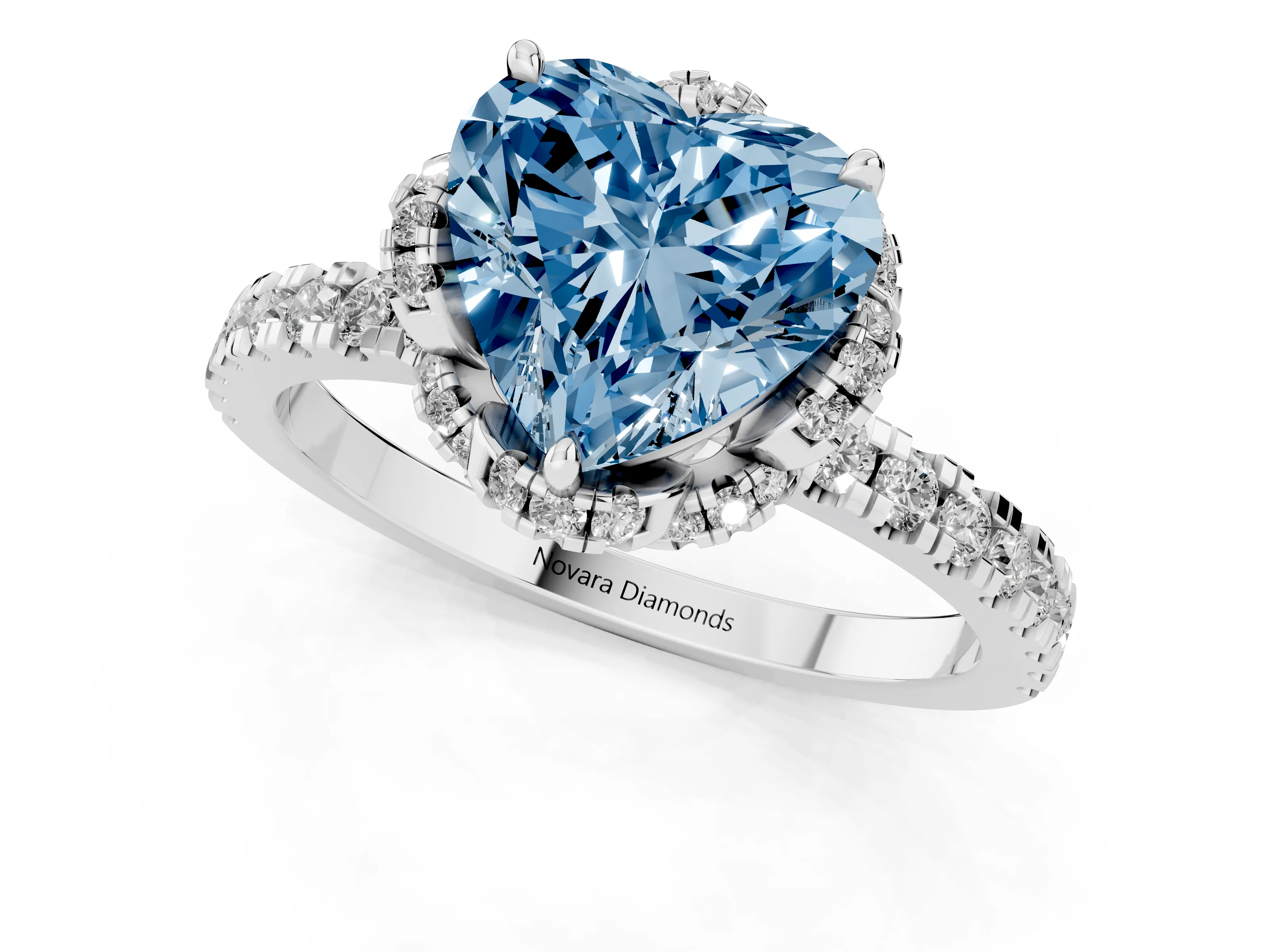 Fancy Blue Heart Cut Diamond Halo Pavé Band Ring Set in White gold with Prong-Held Center