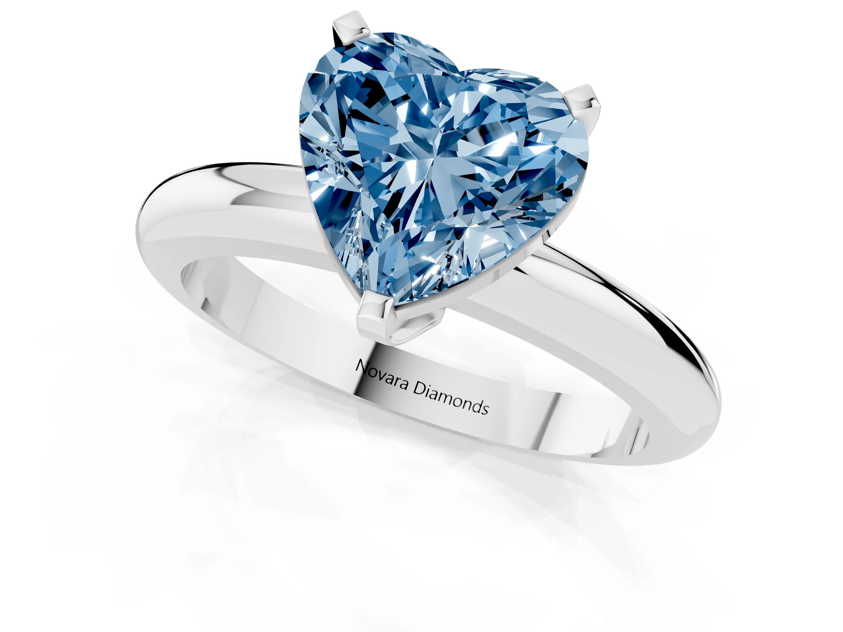 Fancy Blue Heart Cut Diamond Solitaire Engagement Ring Set in White gold with Round Band and Prong Setting