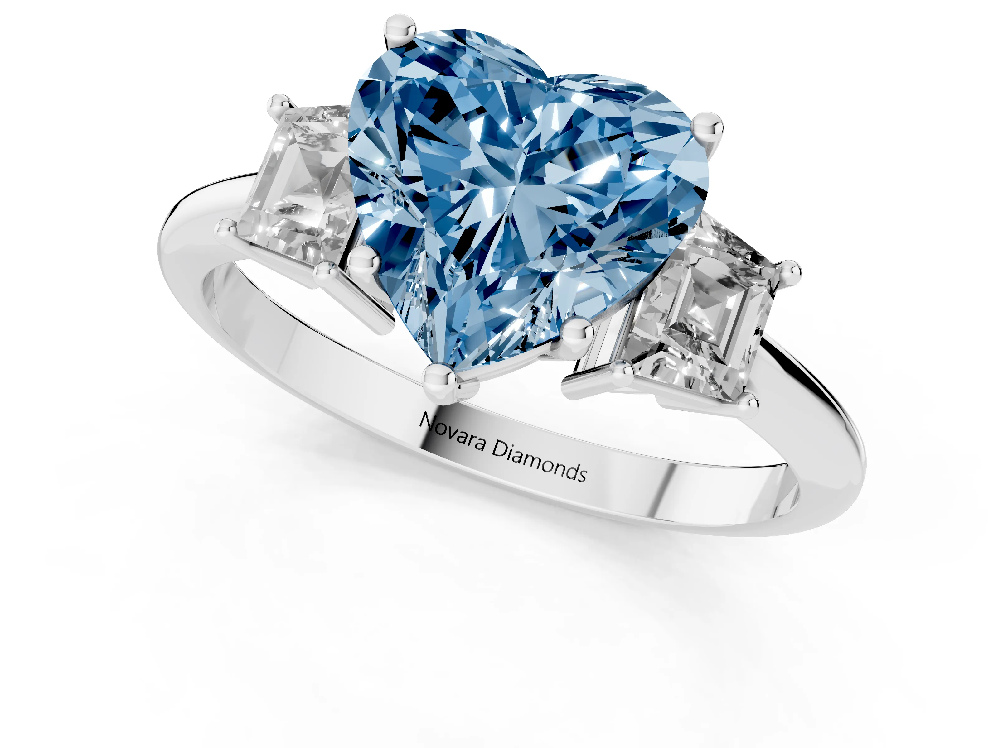 Fancy Blue Heart Cut Diamond Three-Stone Ring Set in Silver with Trapezoid Side Stones and Prong Setting