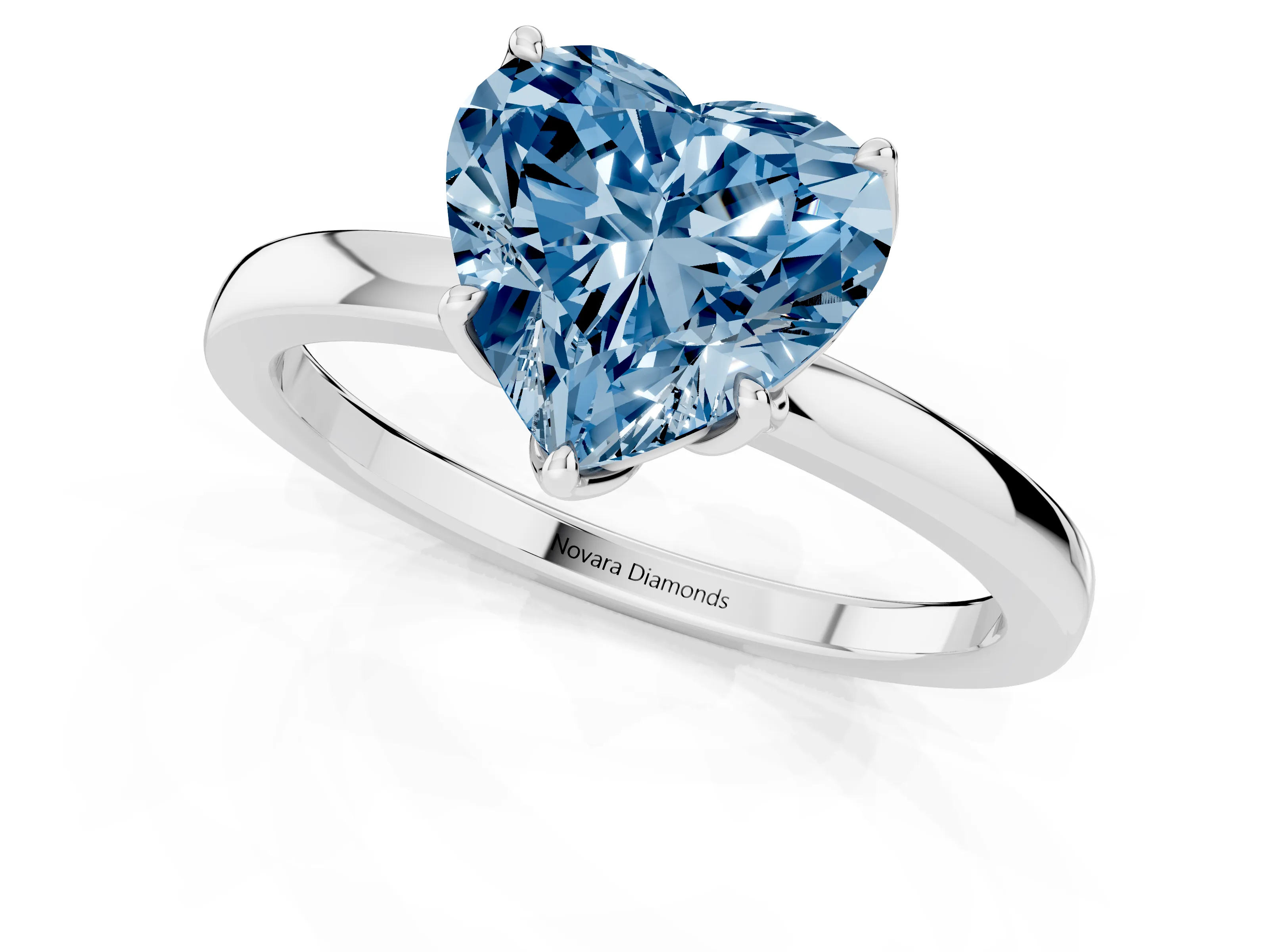 Fancy Blue Heart Cut Diamond Solitaire Ring Set in White gold with Prong Setting and Thin Polished Band