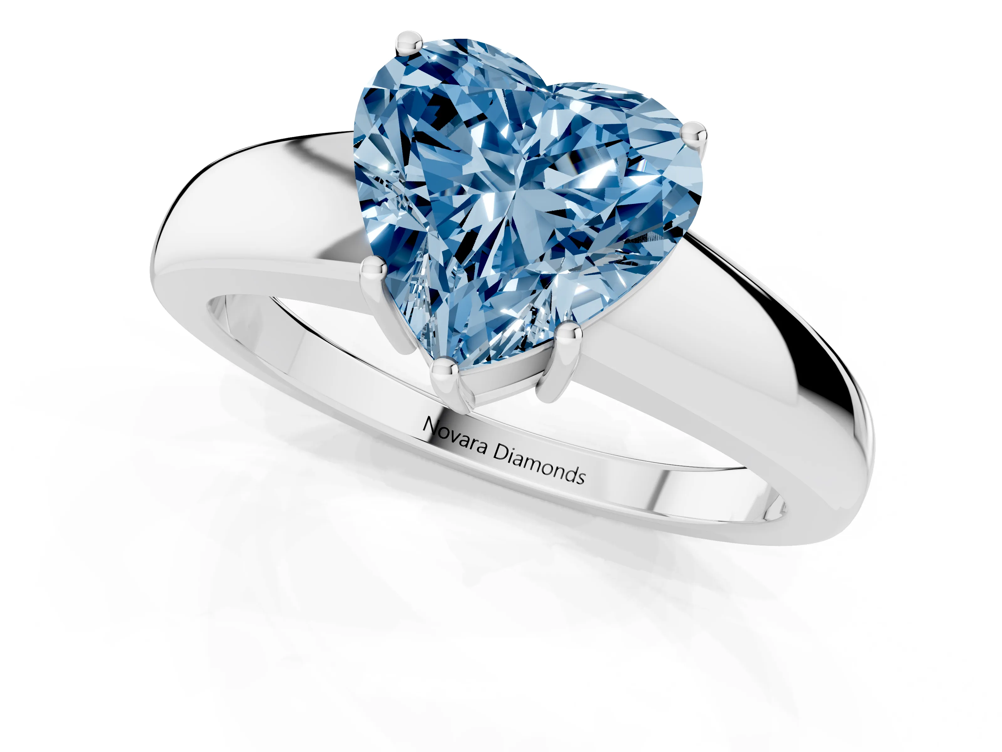 Fancy Blue Heart Cut Diamond Solitaire Ring Set in White gold with Tapered Band and Prong Setting