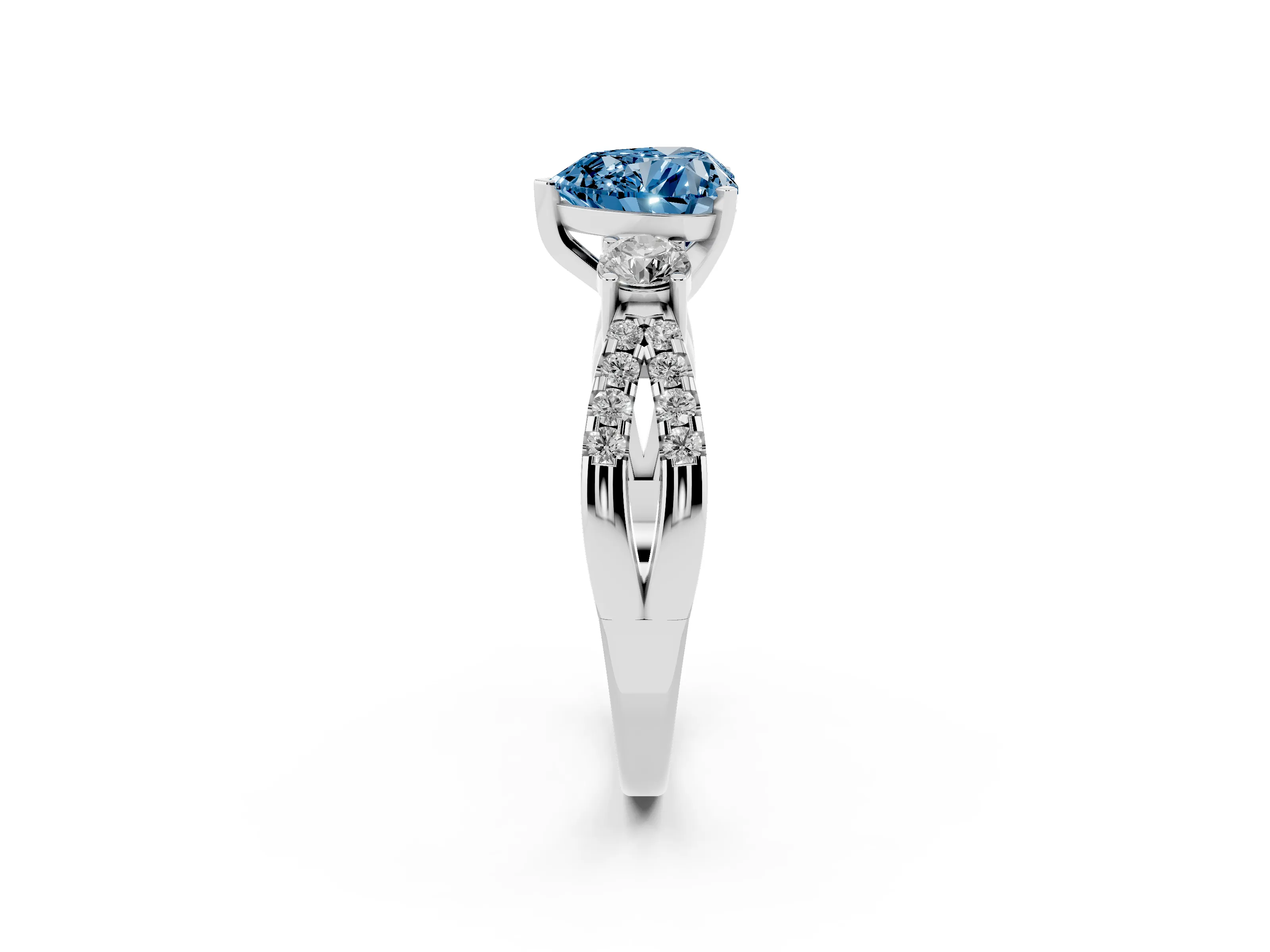 Fancy Blue Heart Cut Diamond Three-Stone Ring Set in White gold with Pavé Split Shank and Prong Setting