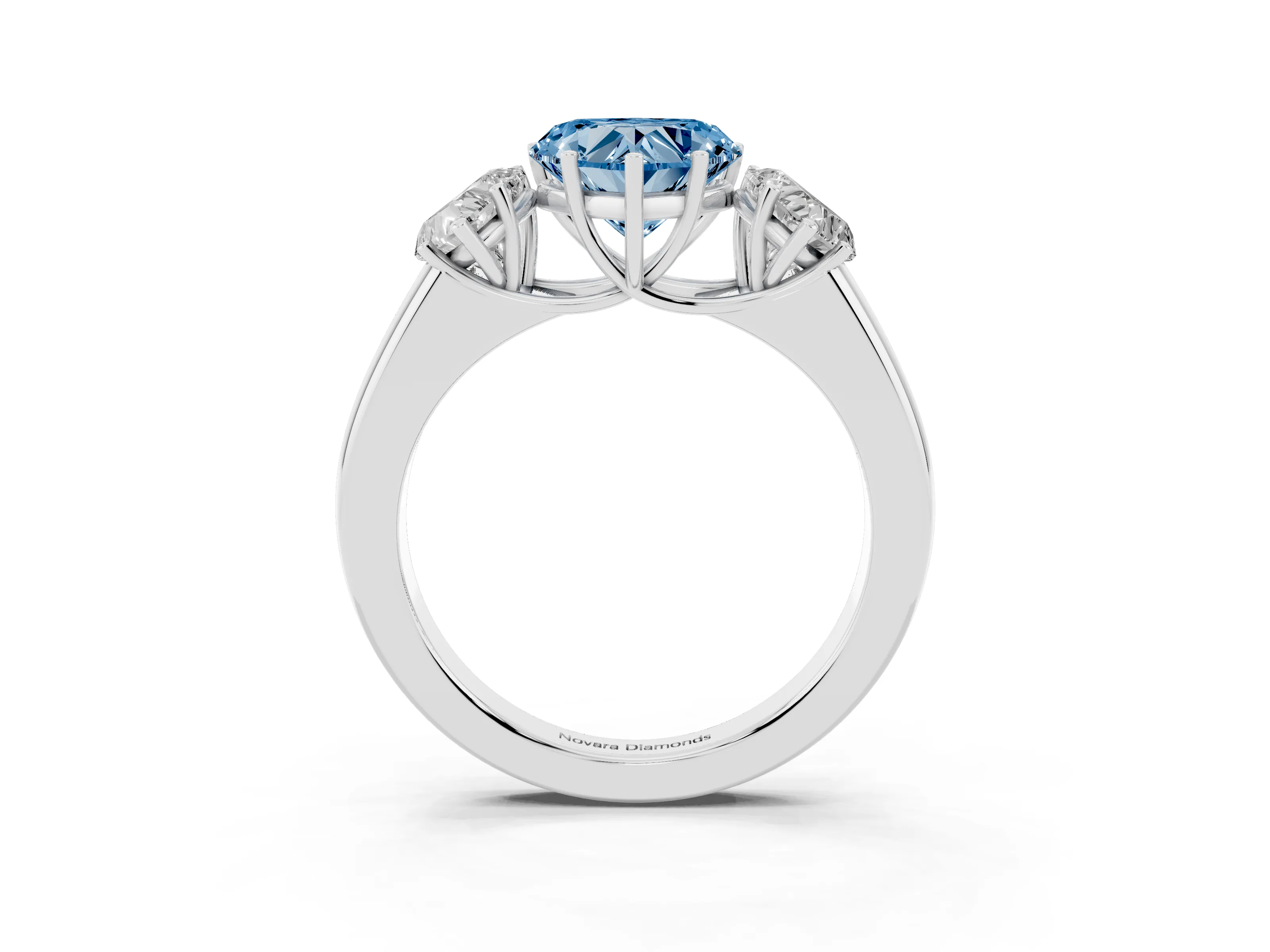 Fancy Blue Three-Stone Heart Cut Diamond Ring Set in Silver with Matching Prong Settings and Plain Band