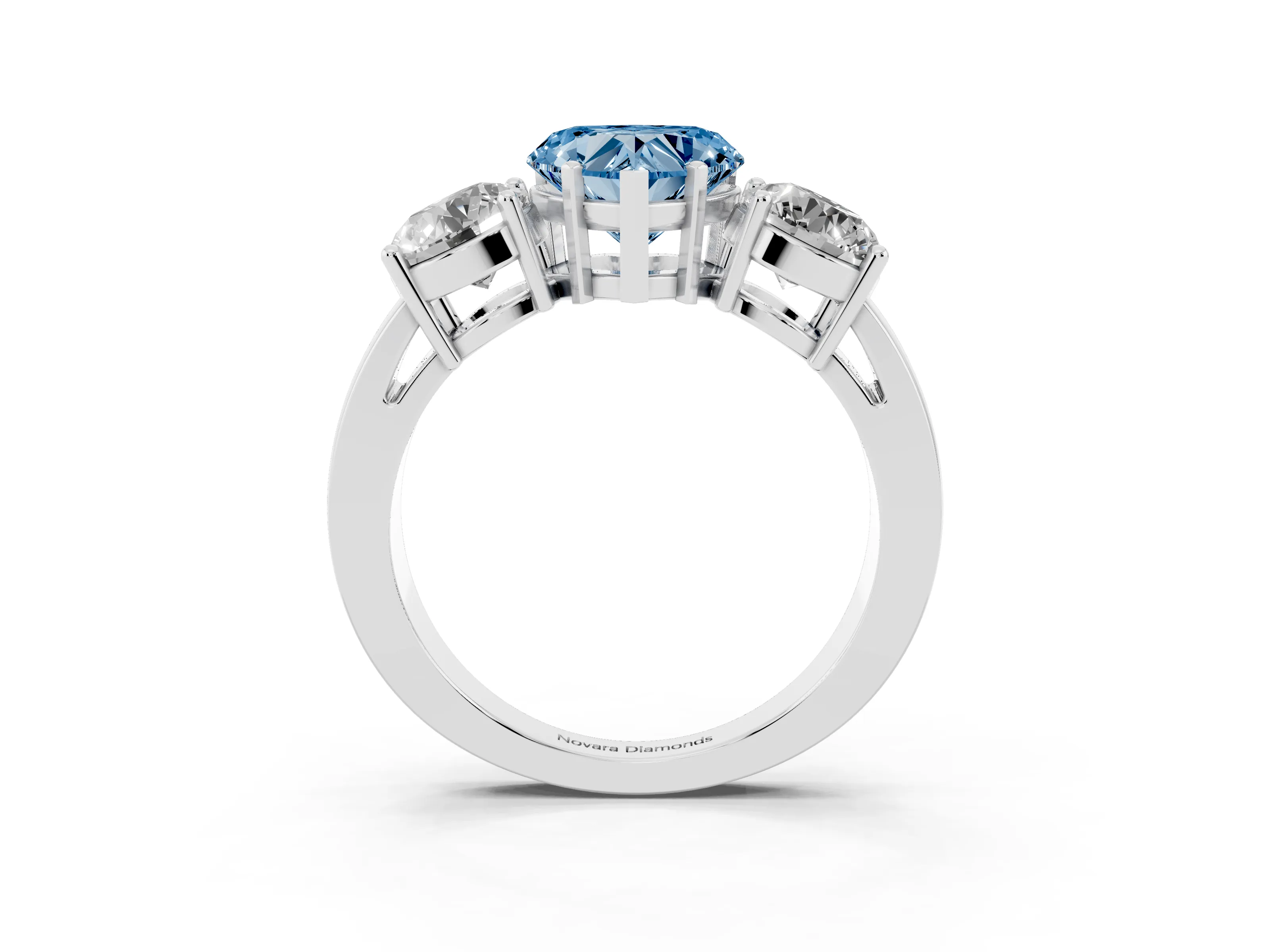 Fancy Blue Heart Cut Diamond Three-Stone Ring Set in Platinum with Round Side Stones and Classic Band
