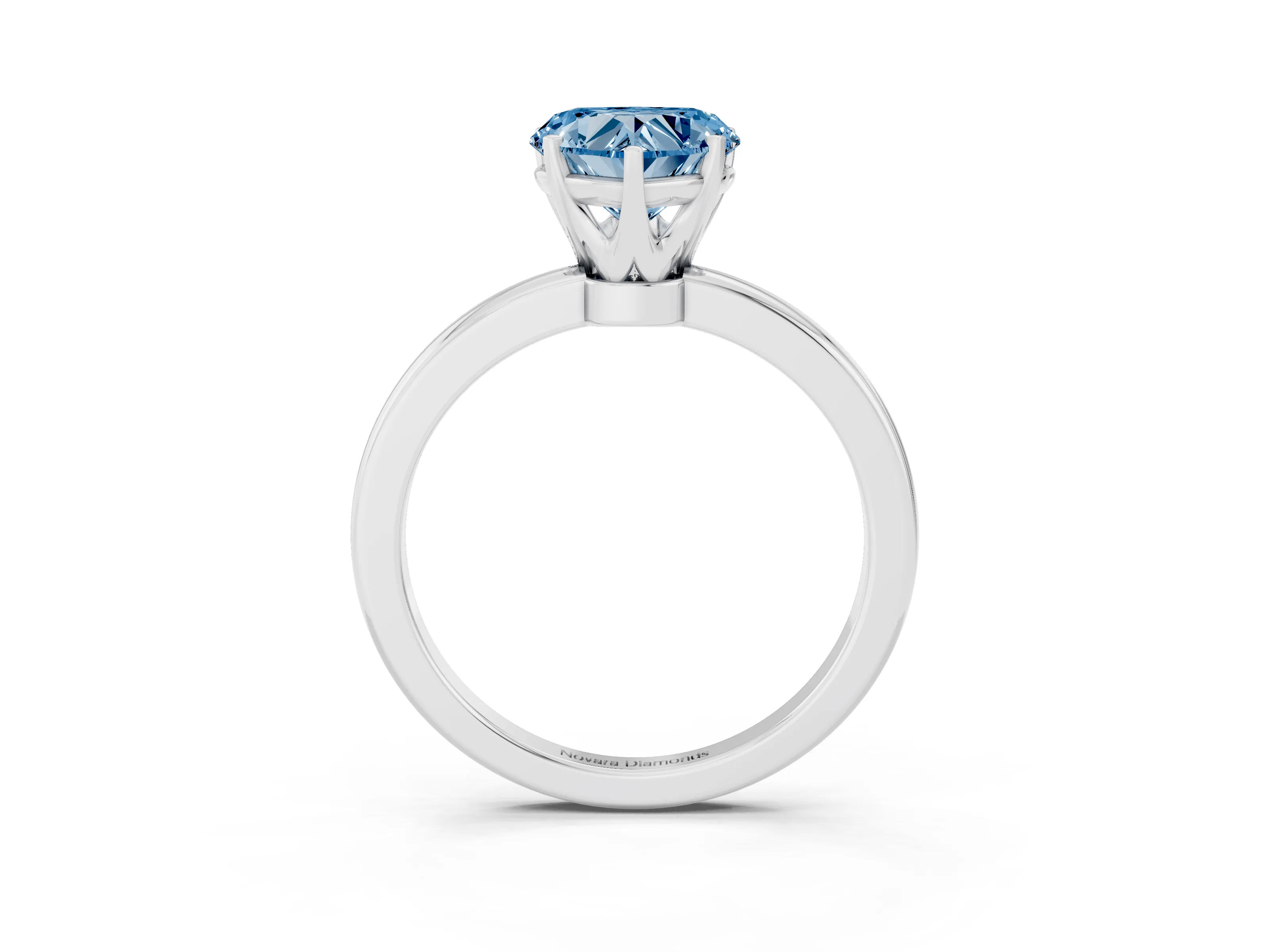 Fancy Blue Heart Cut Diamond Solitaire Ring Set in Silver with Raised Prong Setting on a Classic Band