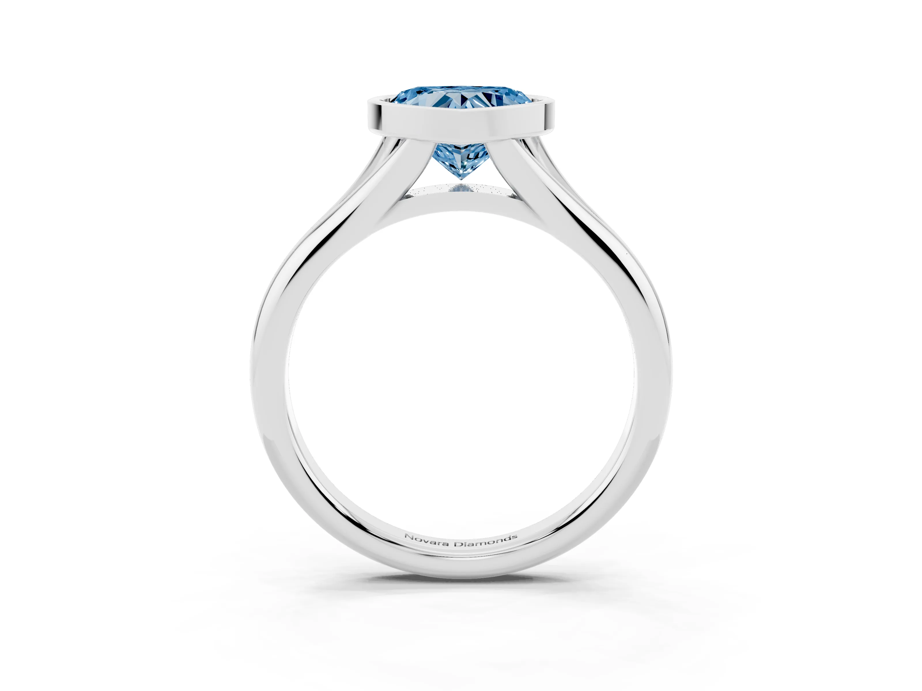 Fancy Blue Bezel Set Heart Cut Diamond Solitaire Ring Set in White gold with Smooth Band