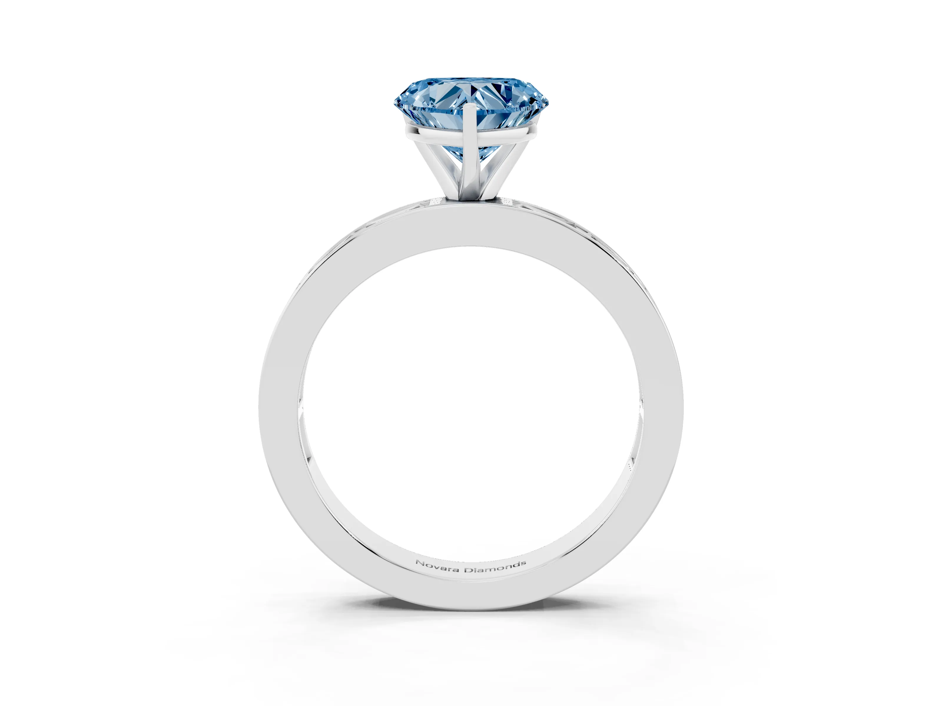 Fancy Blue Heart Cut Diamond Solitaire Ring Set in Silver with Channel-Set Baguette Band and Prong Setting
