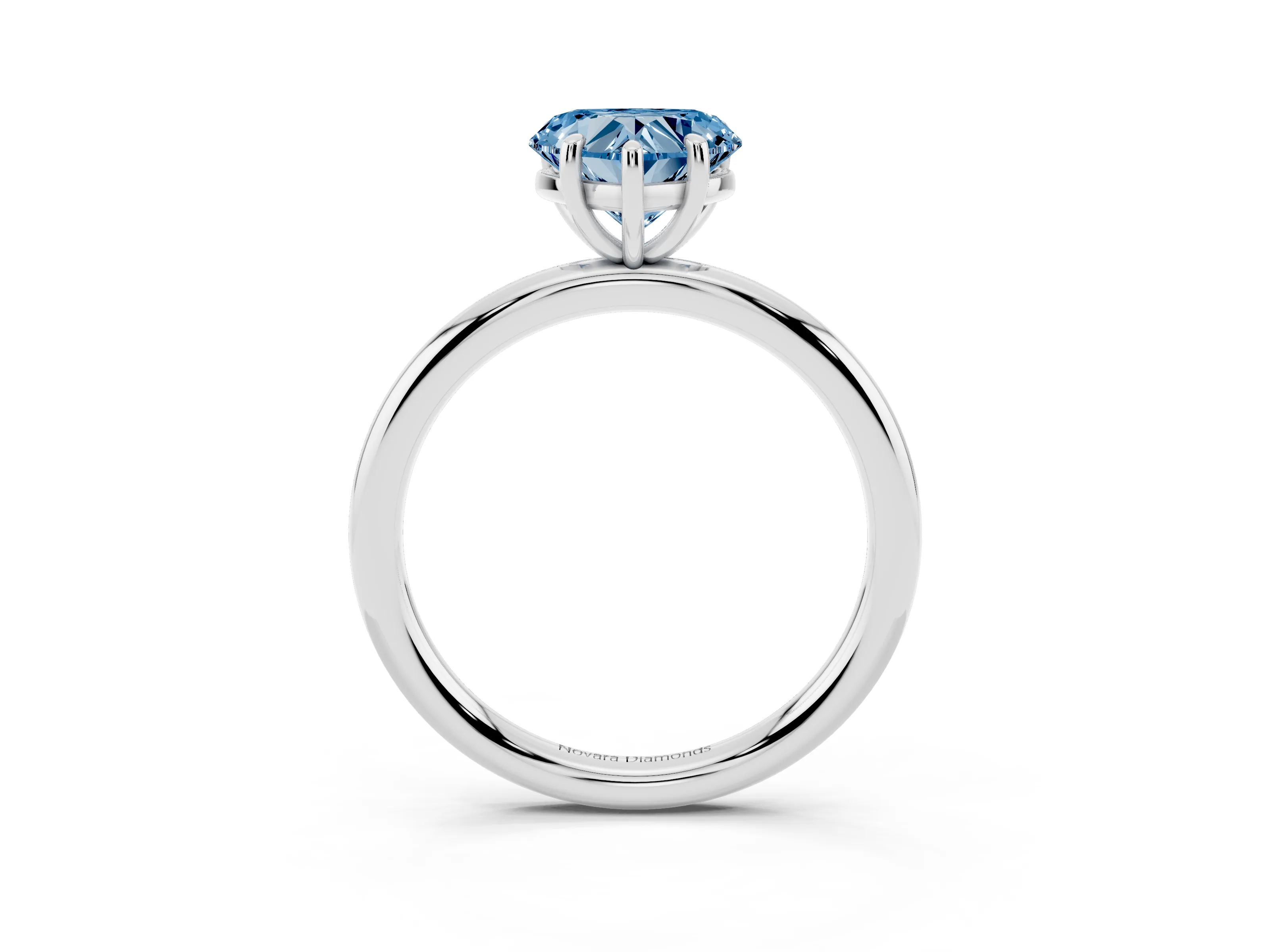 Fancy Blue Heart Cut Diamond Solitaire Ring Set in Platinum with Prong Setting on a Polished Plain Band