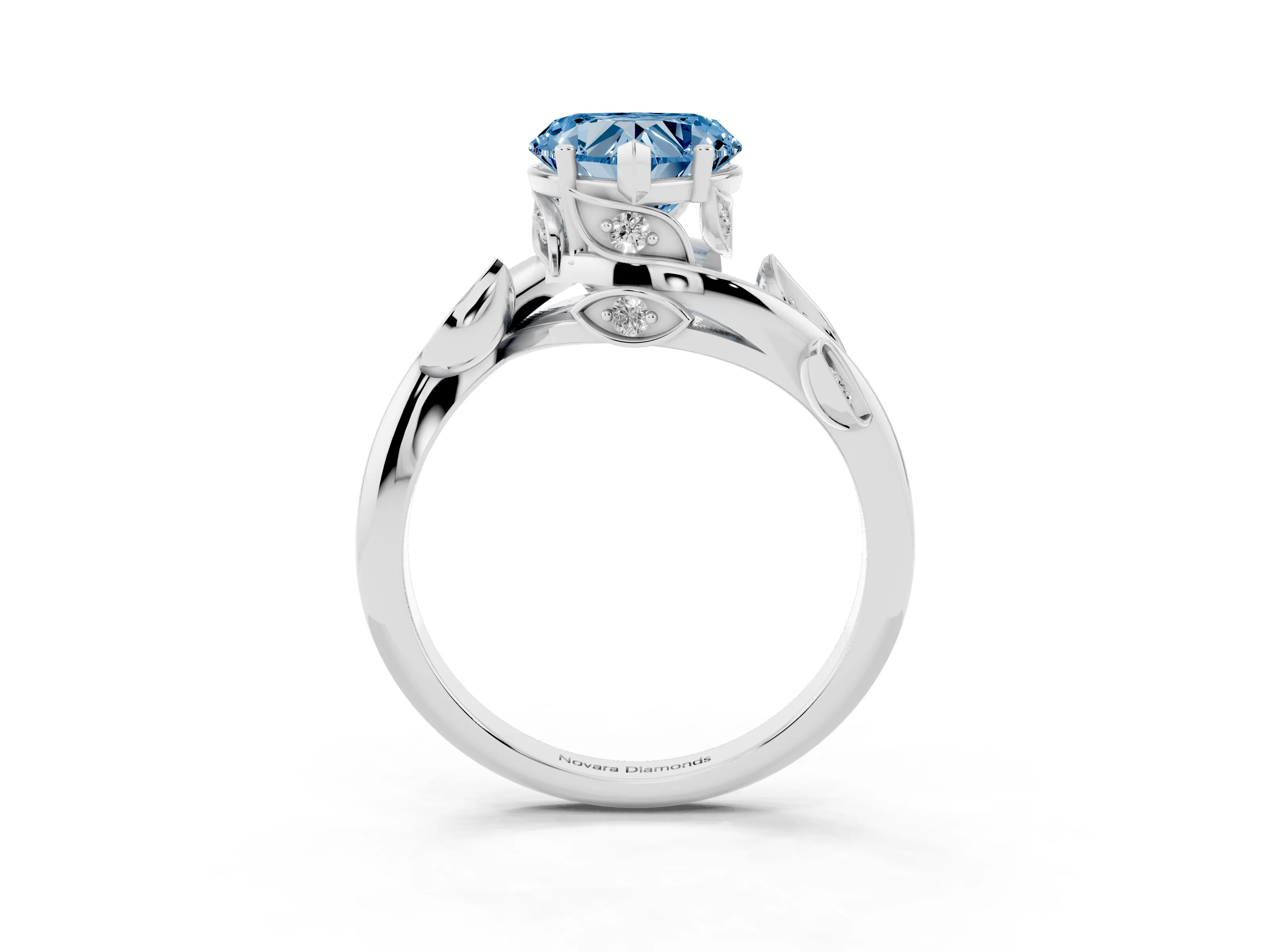 Fancy Blue Heart Cut Diamond Solitaire Twist Engagement Ring Set in White gold with Pavé Leaf Accents