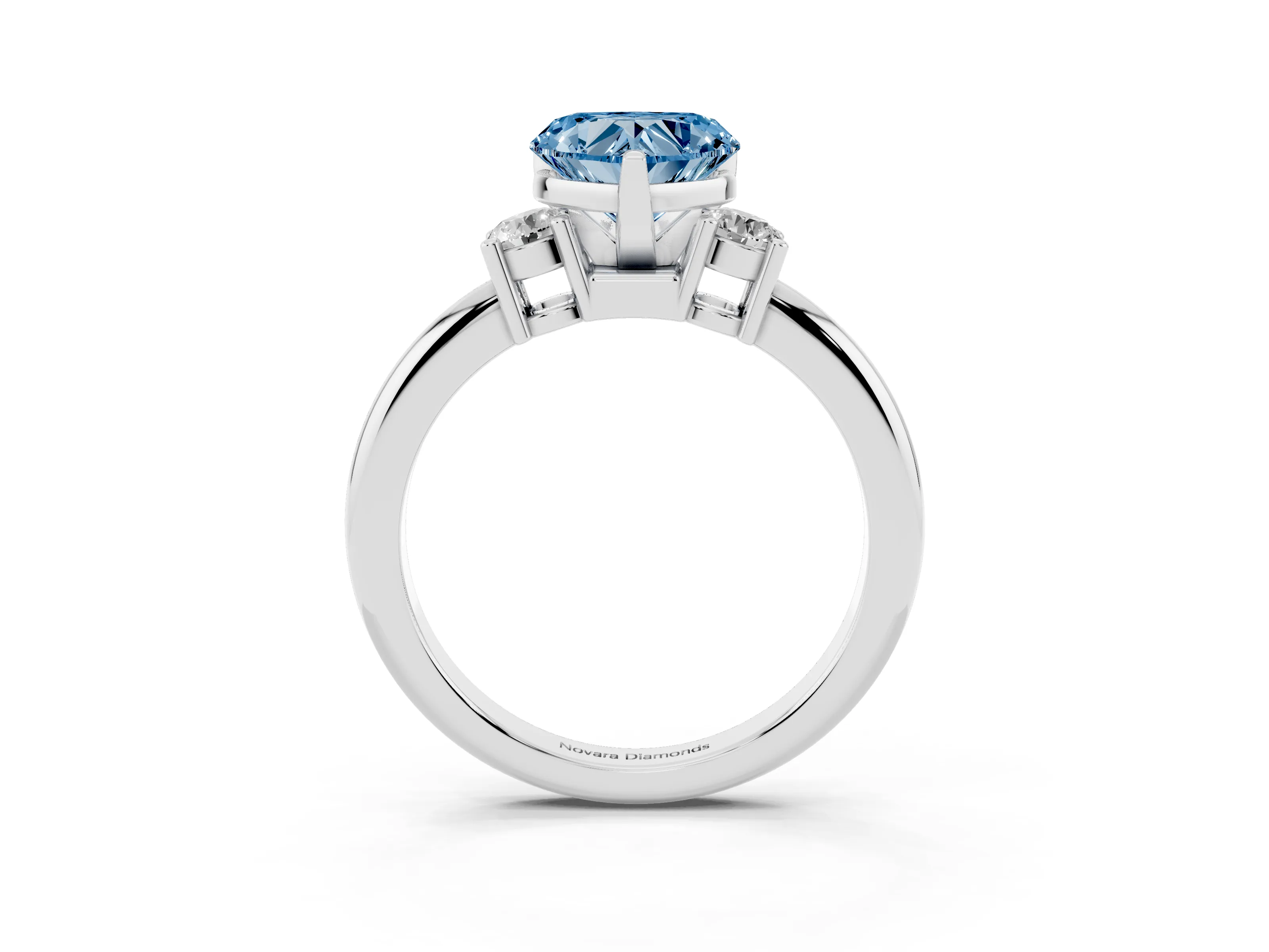 Fancy Blue Three-Stone Heart Cut Diamond Ring Set in White gold with Prong Setting and Plain Band