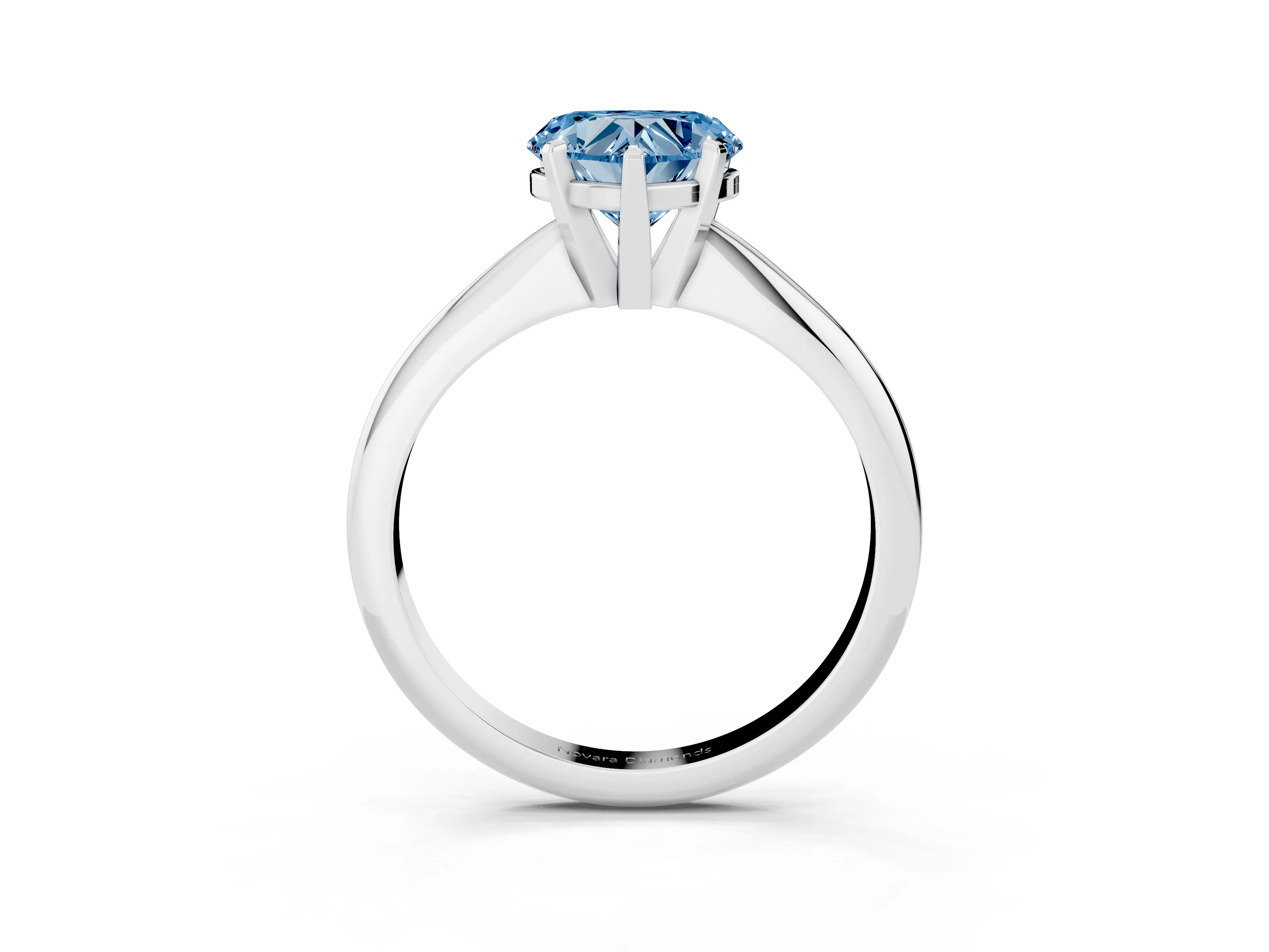 Fancy Blue Heart Cut Diamond Solitaire Ring Set in Silver with Prong Setting on a Plain Round Band