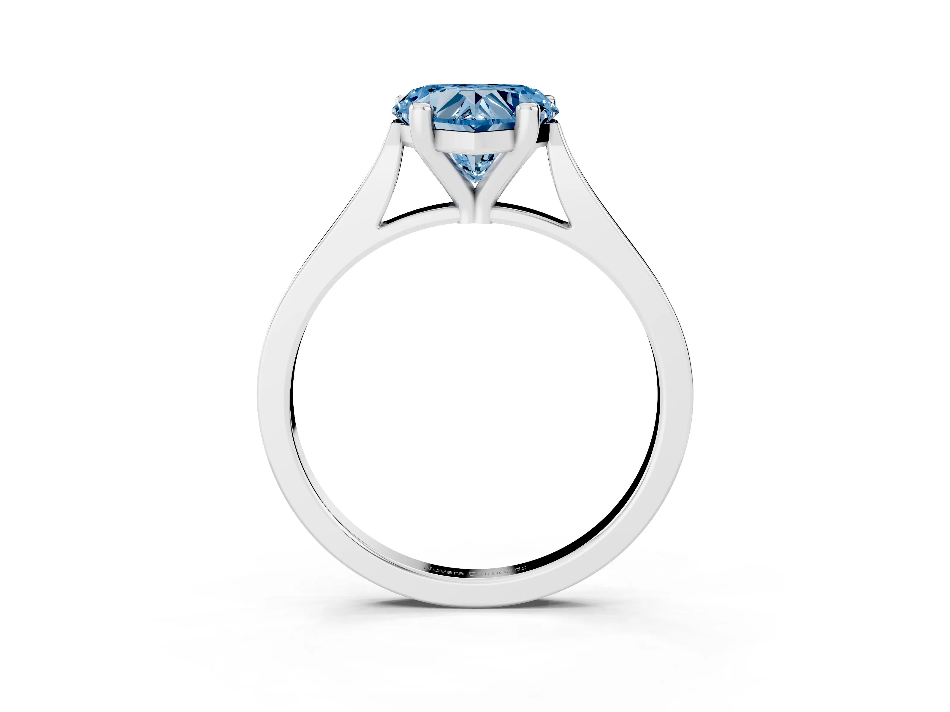Fancy Blue Heart Cut Diamond Solitaire Ring Set in Platinum with Prong Setting and Tapered Band