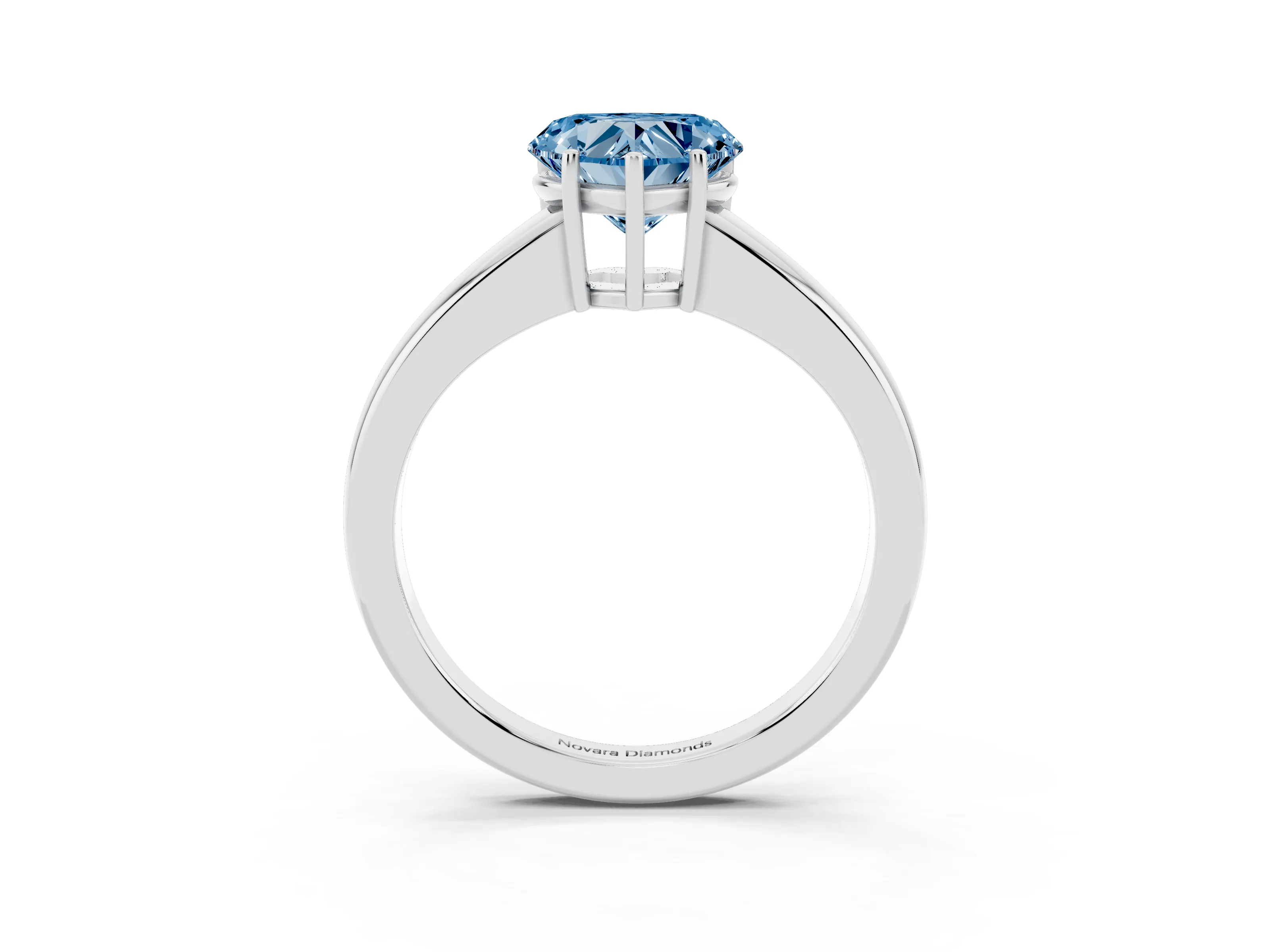 Fancy Blue Heart Cut Diamond Solitaire Ring Set in White gold with Tapered Band and Prong Setting