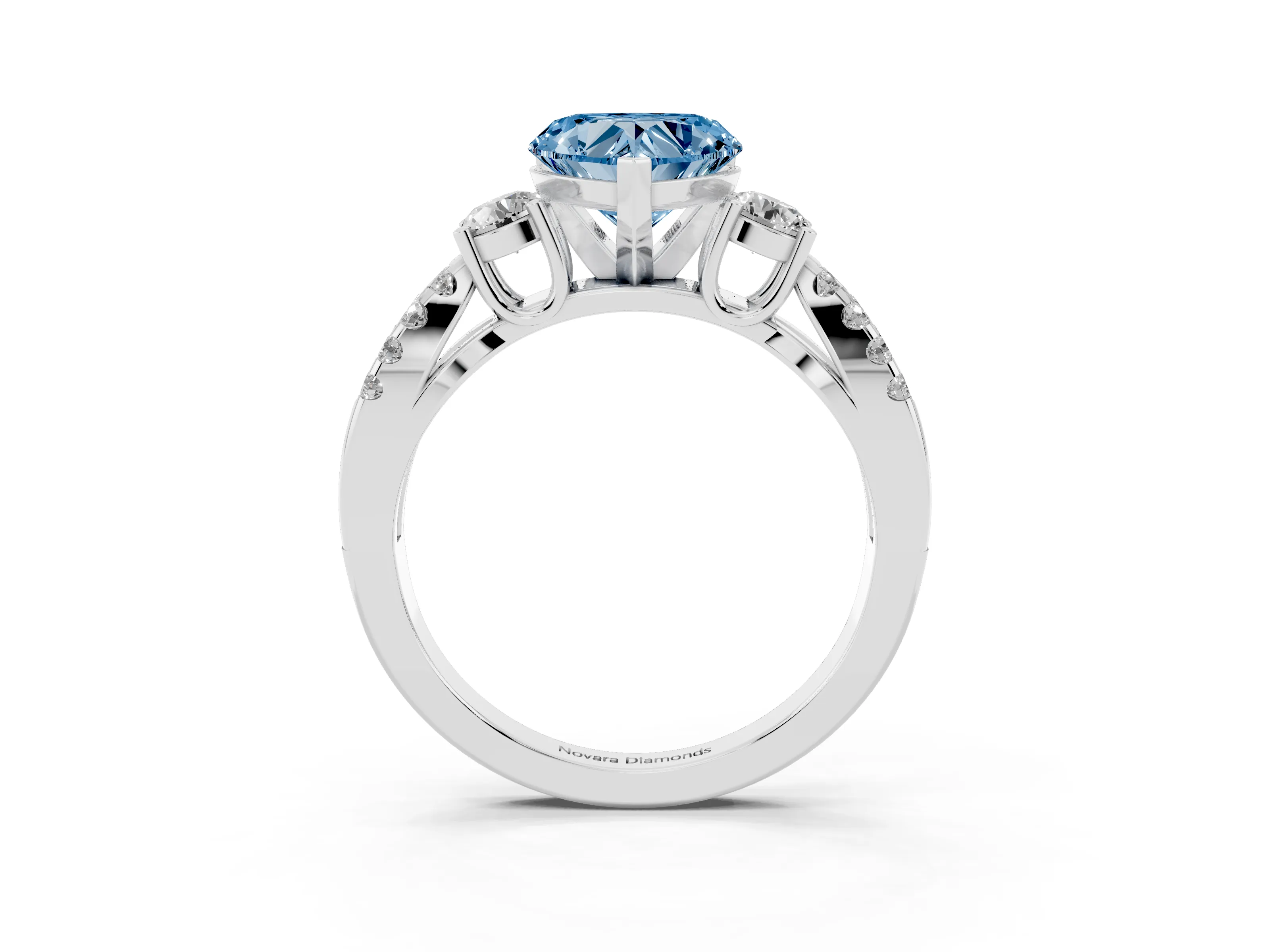 Fancy Blue Heart Cut Diamond Three-Stone Ring Set in White gold with Pavé Split Shank and Prong Setting